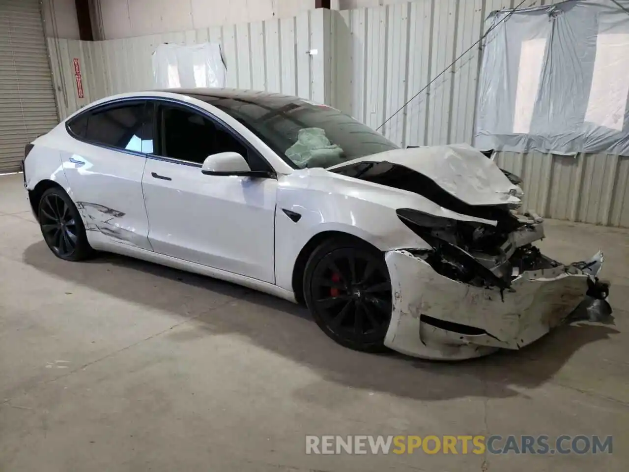 4 Photograph of a damaged car 5YJ3E1EC9LF802124 TESLA MODEL 3 2020