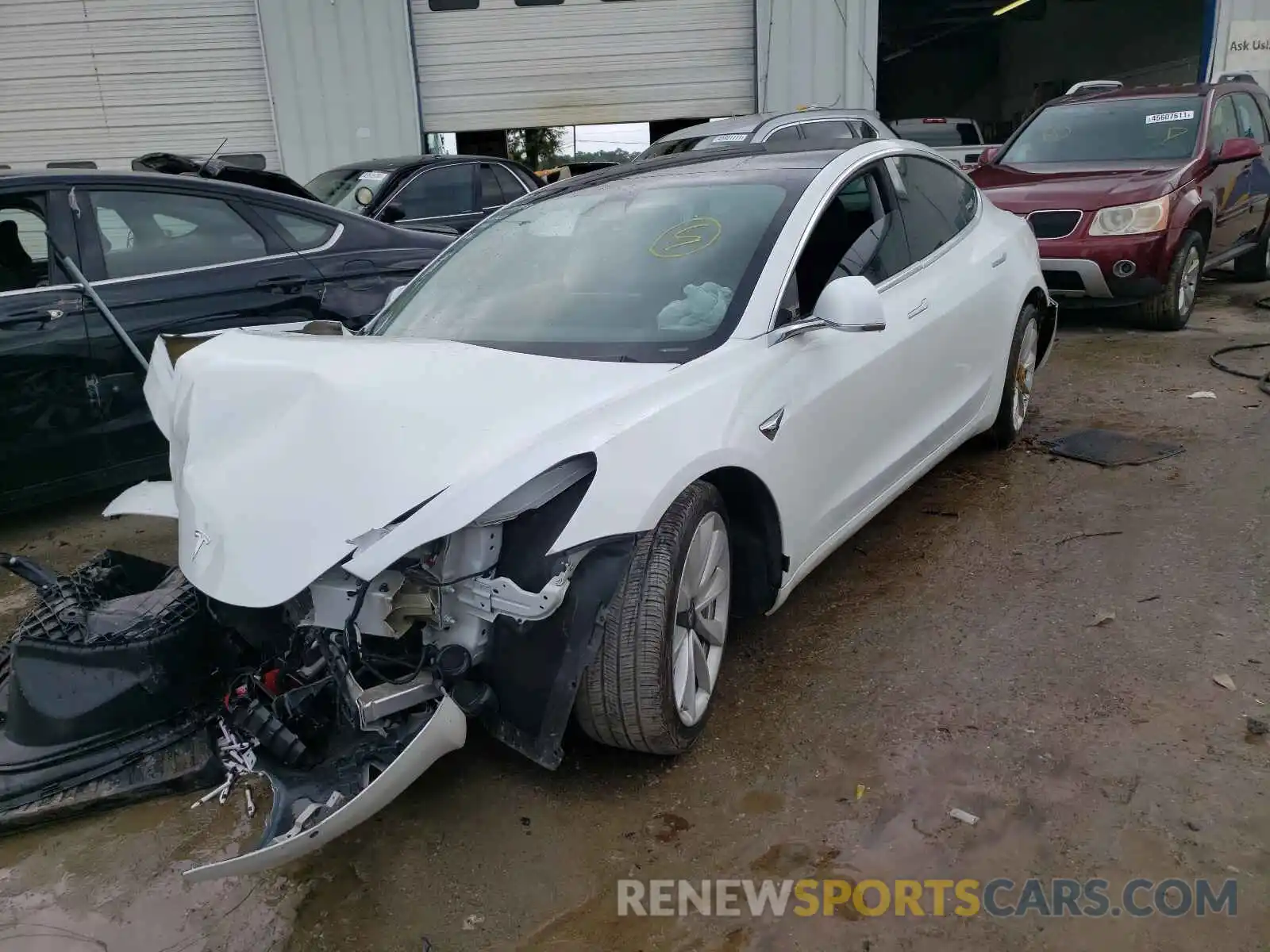 2 Photograph of a damaged car 5YJ3E1ECXLF587109 TESLA MODEL 3 2020