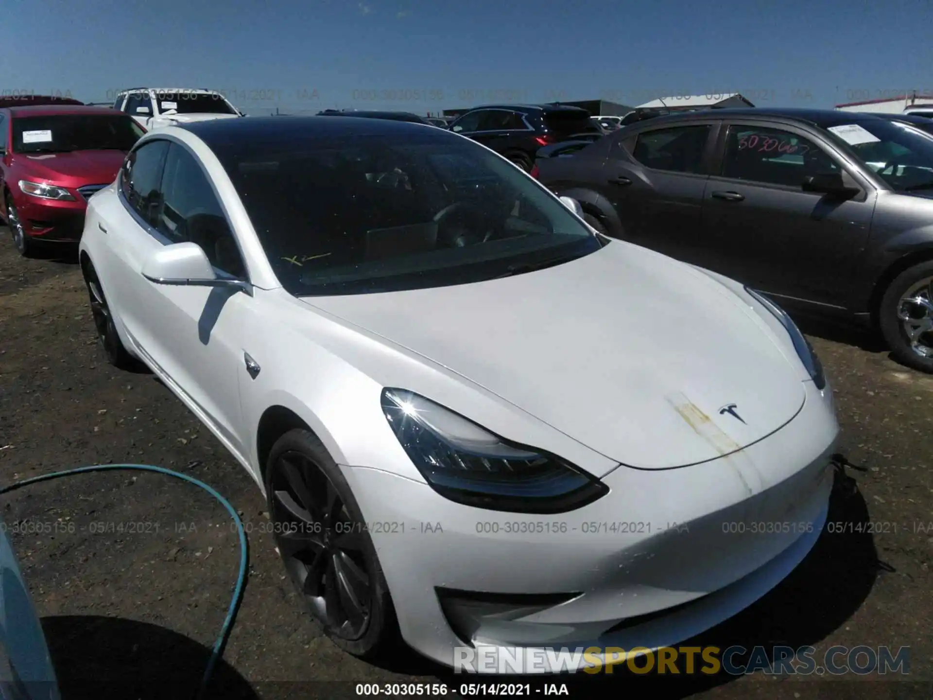 1 Photograph of a damaged car 5YJ3E1ECXLF623963 TESLA MODEL 3 2020