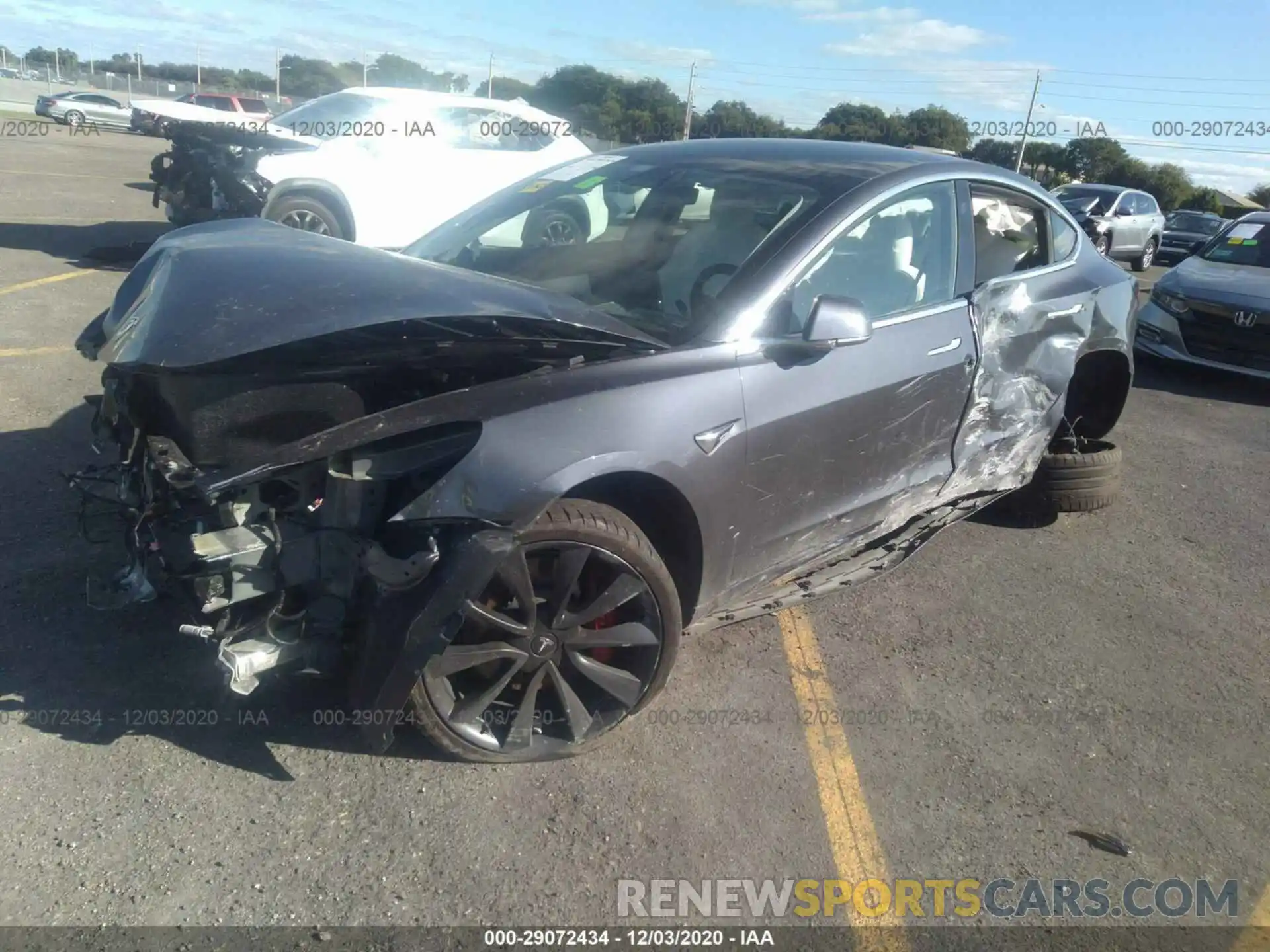 2 Photograph of a damaged car 5YJ3E1ECXLF714618 TESLA MODEL 3 2020