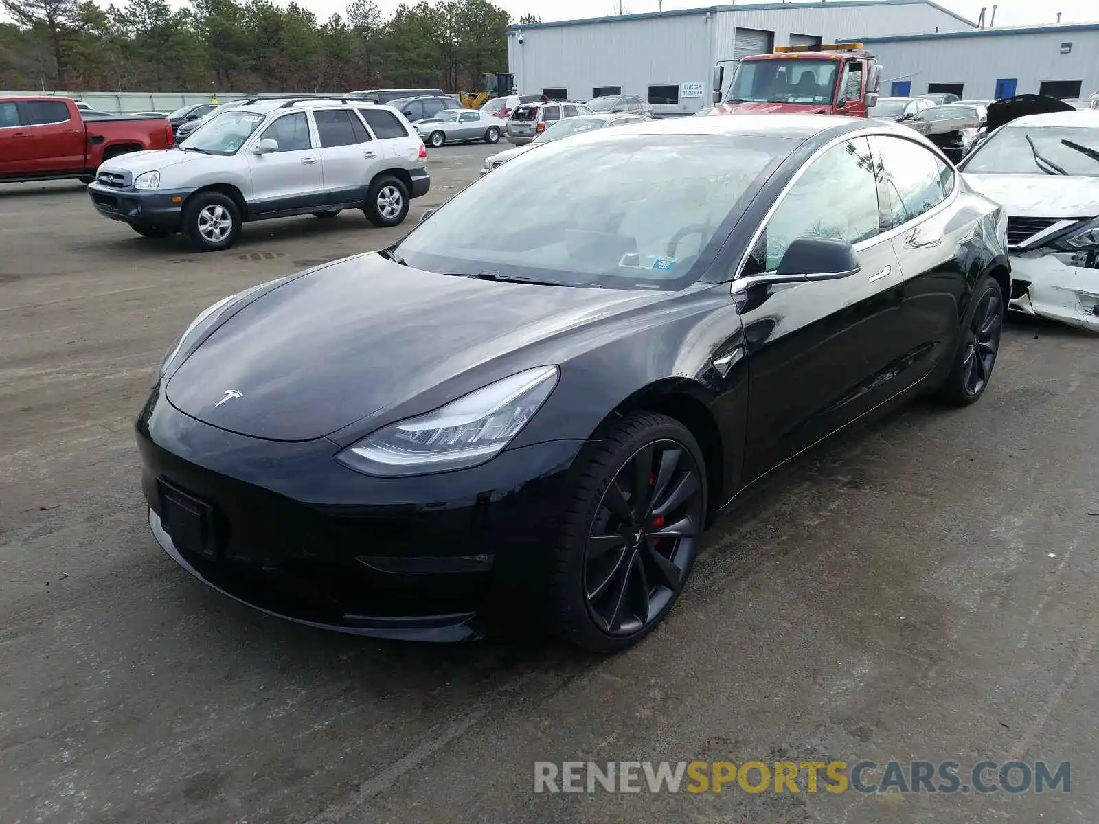 2 Photograph of a damaged car 5YJ3E1ECXLF736344 TESLA MODEL 3 2020