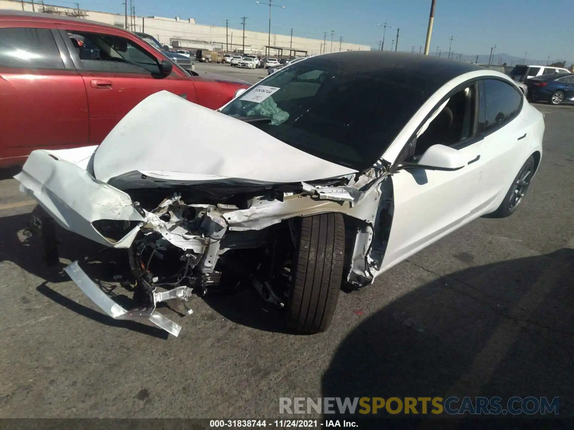 2 Photograph of a damaged car 5YJ3E1EA0MF001937 TESLA MODEL 3 2021