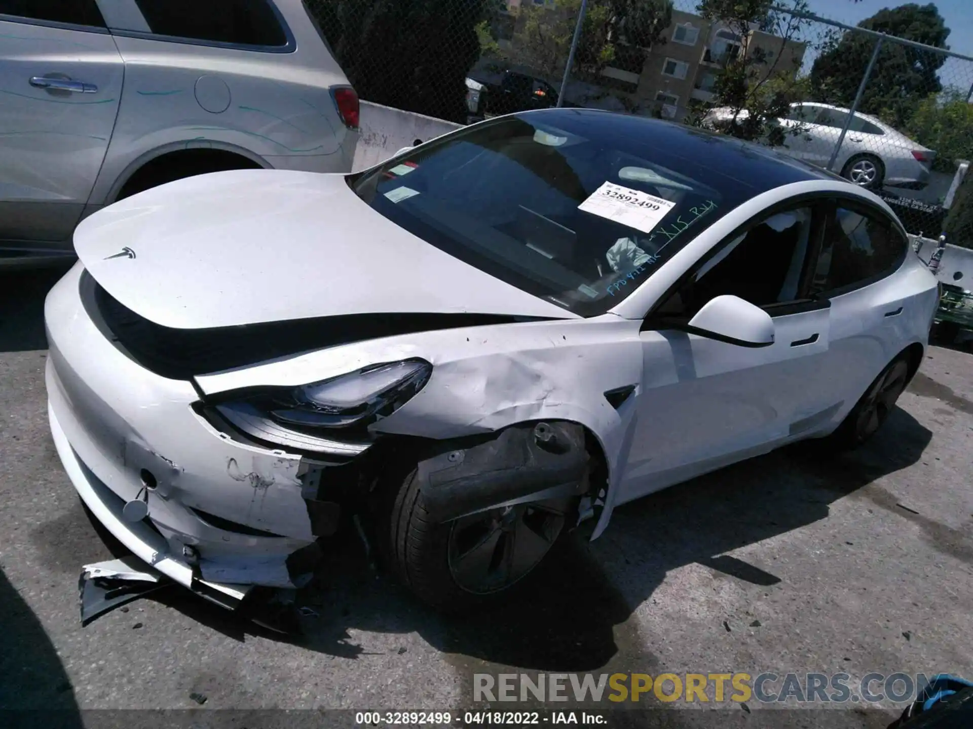 2 Photograph of a damaged car 5YJ3E1EA0MF014655 TESLA MODEL 3 2021