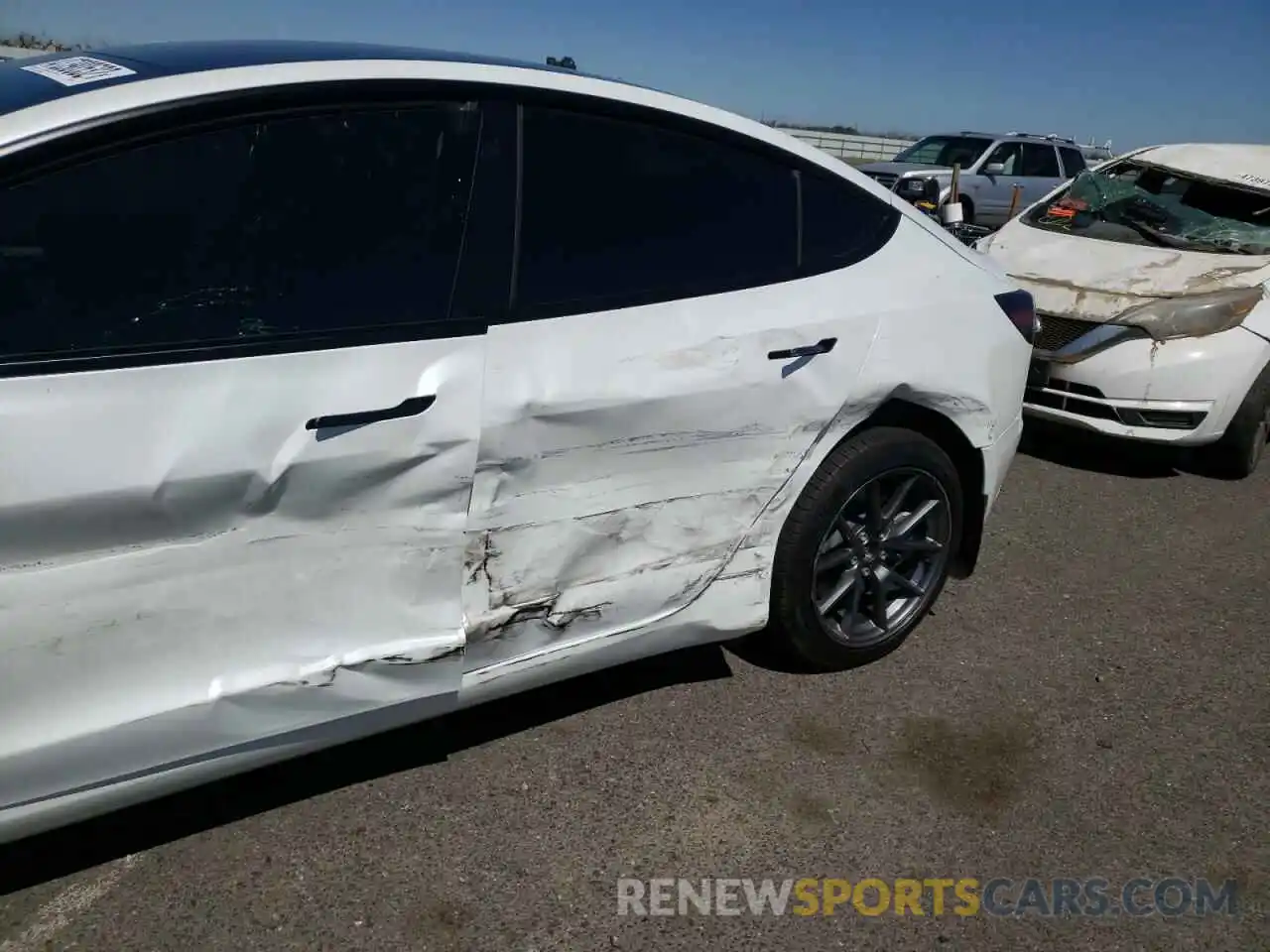 9 Photograph of a damaged car 5YJ3E1EA0MF017071 TESLA MODEL 3 2021