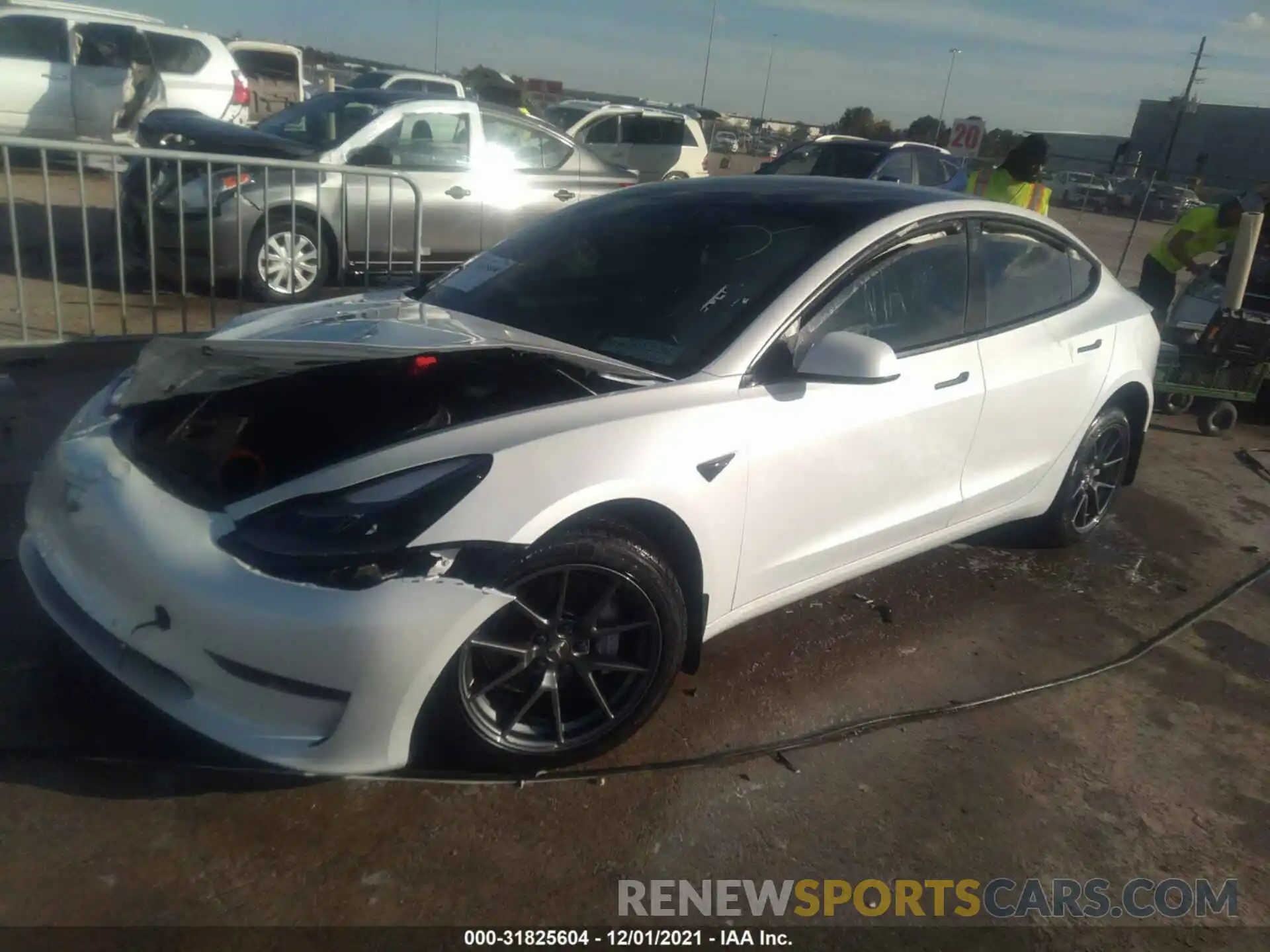 2 Photograph of a damaged car 5YJ3E1EA0MF018608 TESLA MODEL 3 2021