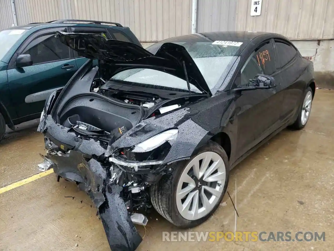 2 Photograph of a damaged car 5YJ3E1EA0MF019242 TESLA MODEL 3 2021