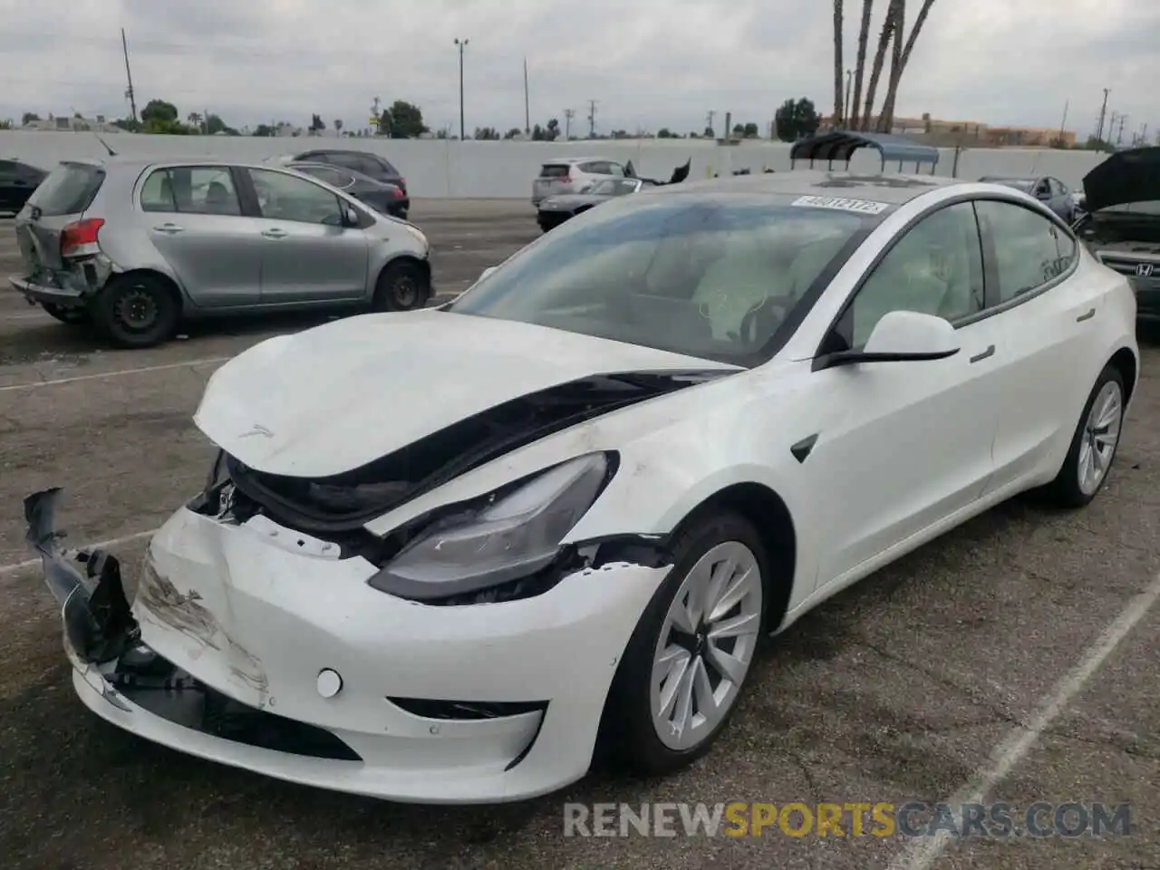 2 Photograph of a damaged car 5YJ3E1EA0MF046909 TESLA MODEL 3 2021