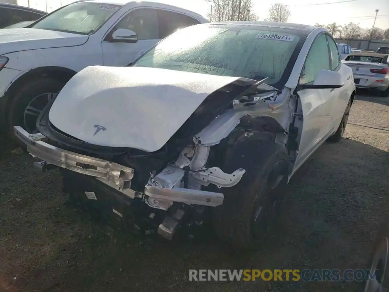 2 Photograph of a damaged car 5YJ3E1EA0MF072068 TESLA MODEL 3 2021