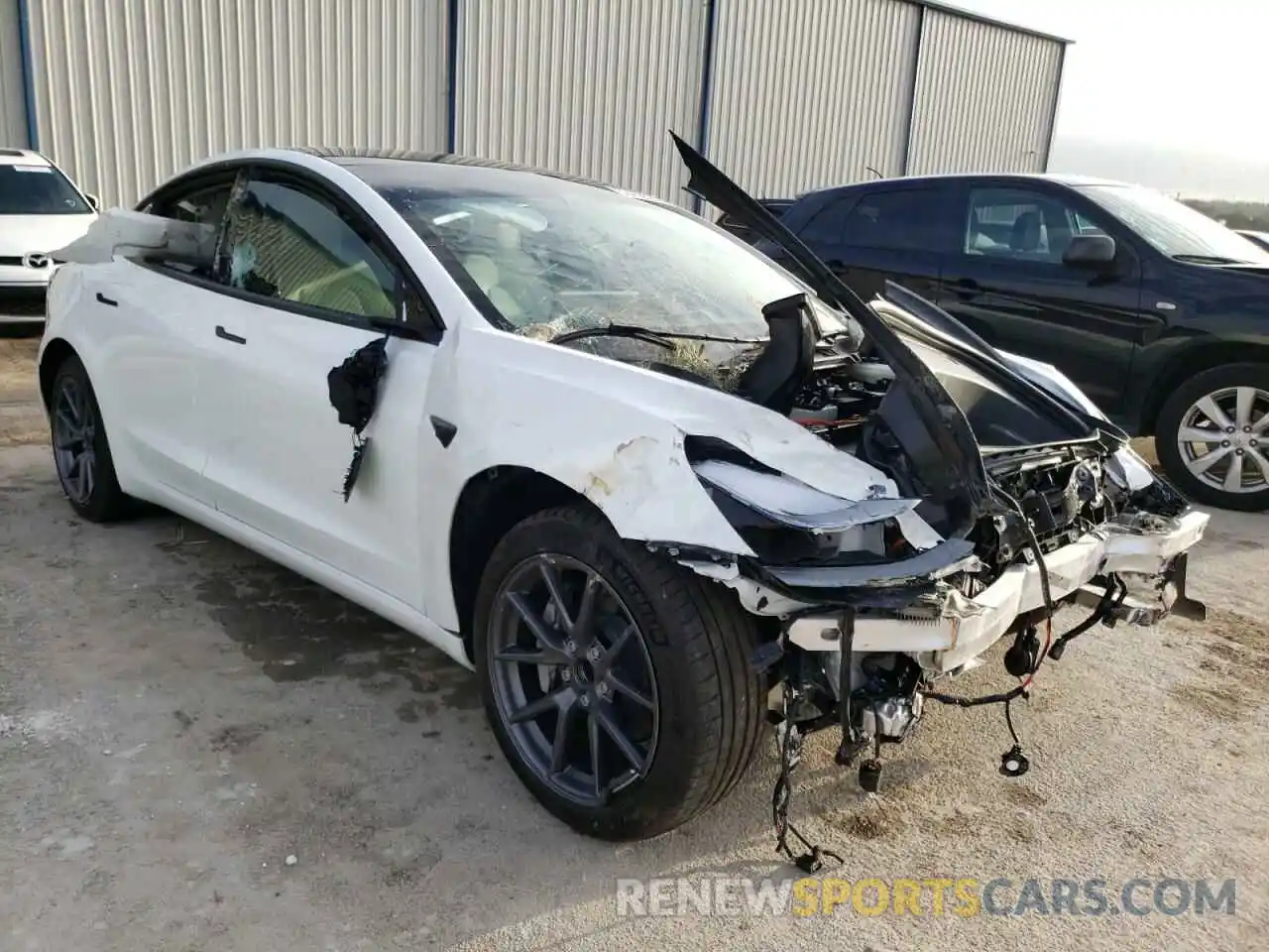 1 Photograph of a damaged car 5YJ3E1EA0MF082020 TESLA MODEL 3 2021