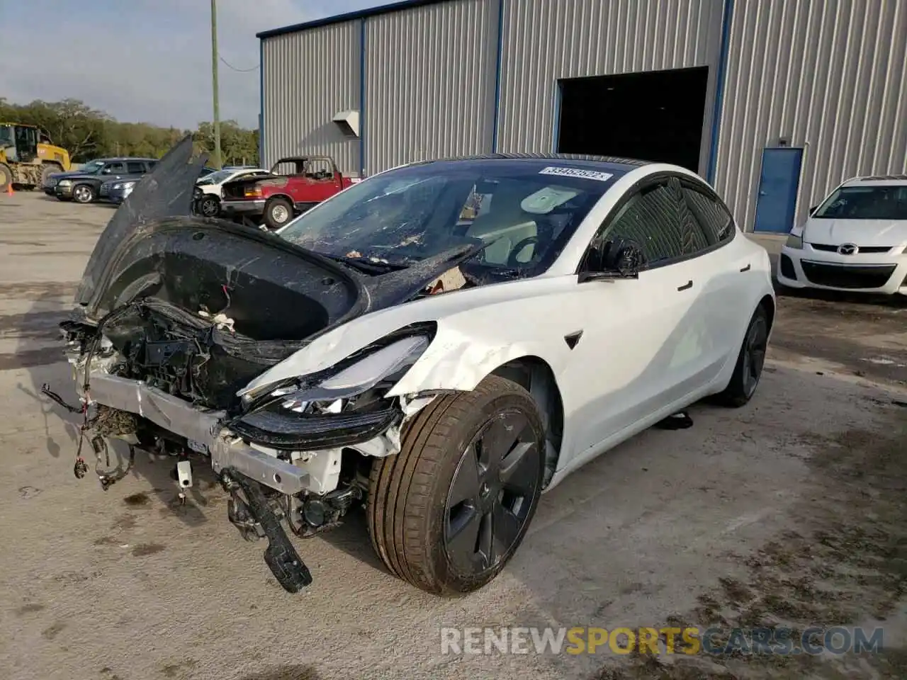 2 Photograph of a damaged car 5YJ3E1EA0MF082020 TESLA MODEL 3 2021