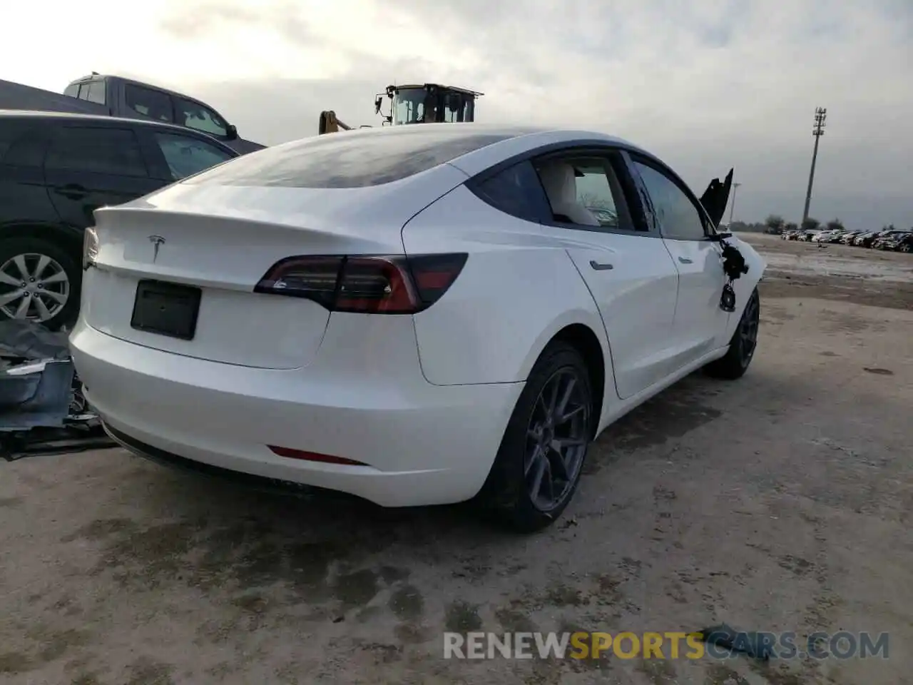 4 Photograph of a damaged car 5YJ3E1EA0MF082020 TESLA MODEL 3 2021