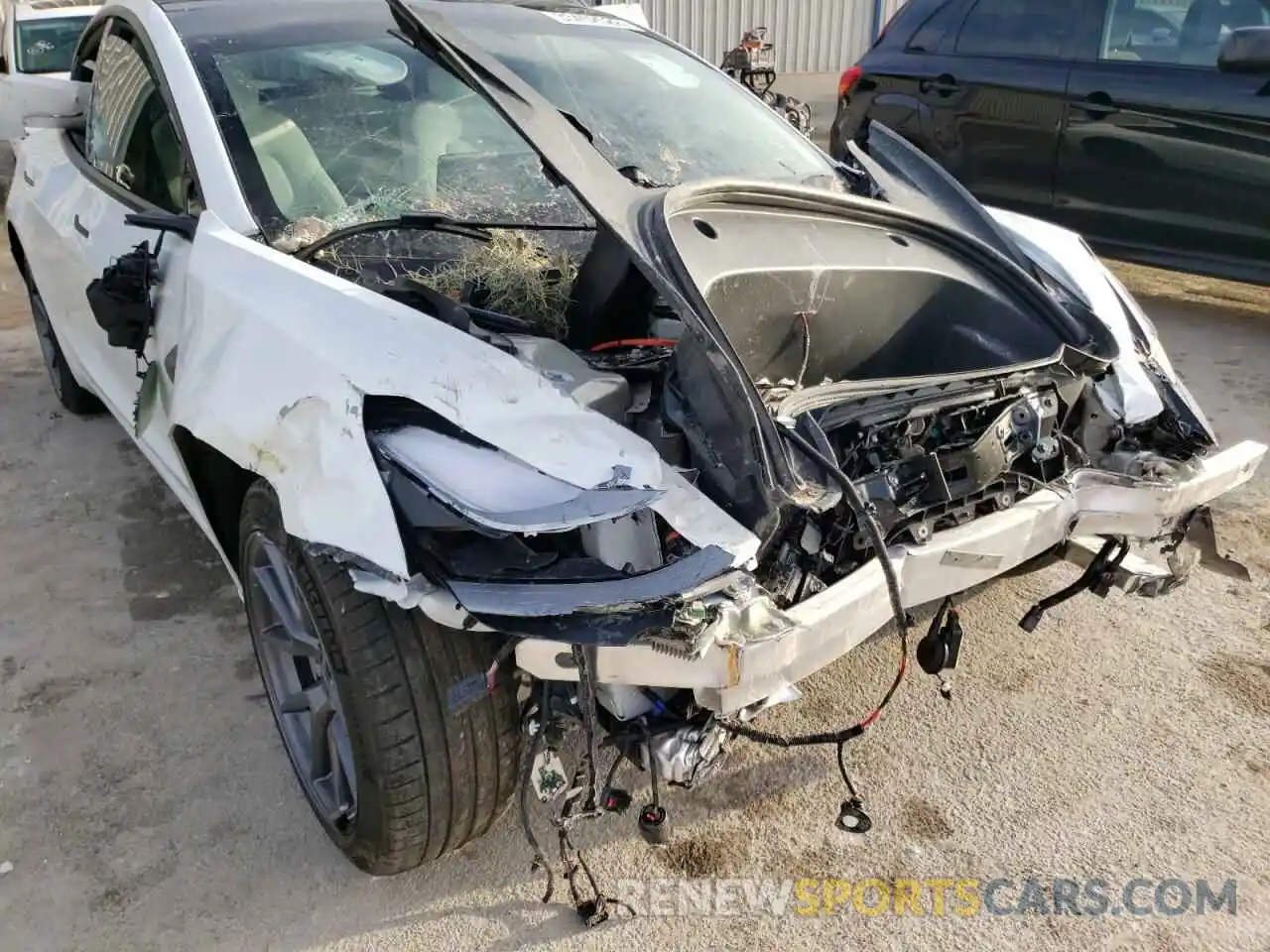 9 Photograph of a damaged car 5YJ3E1EA0MF082020 TESLA MODEL 3 2021