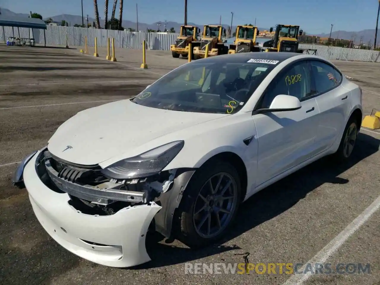 2 Photograph of a damaged car 5YJ3E1EA0MF091705 TESLA MODEL 3 2021