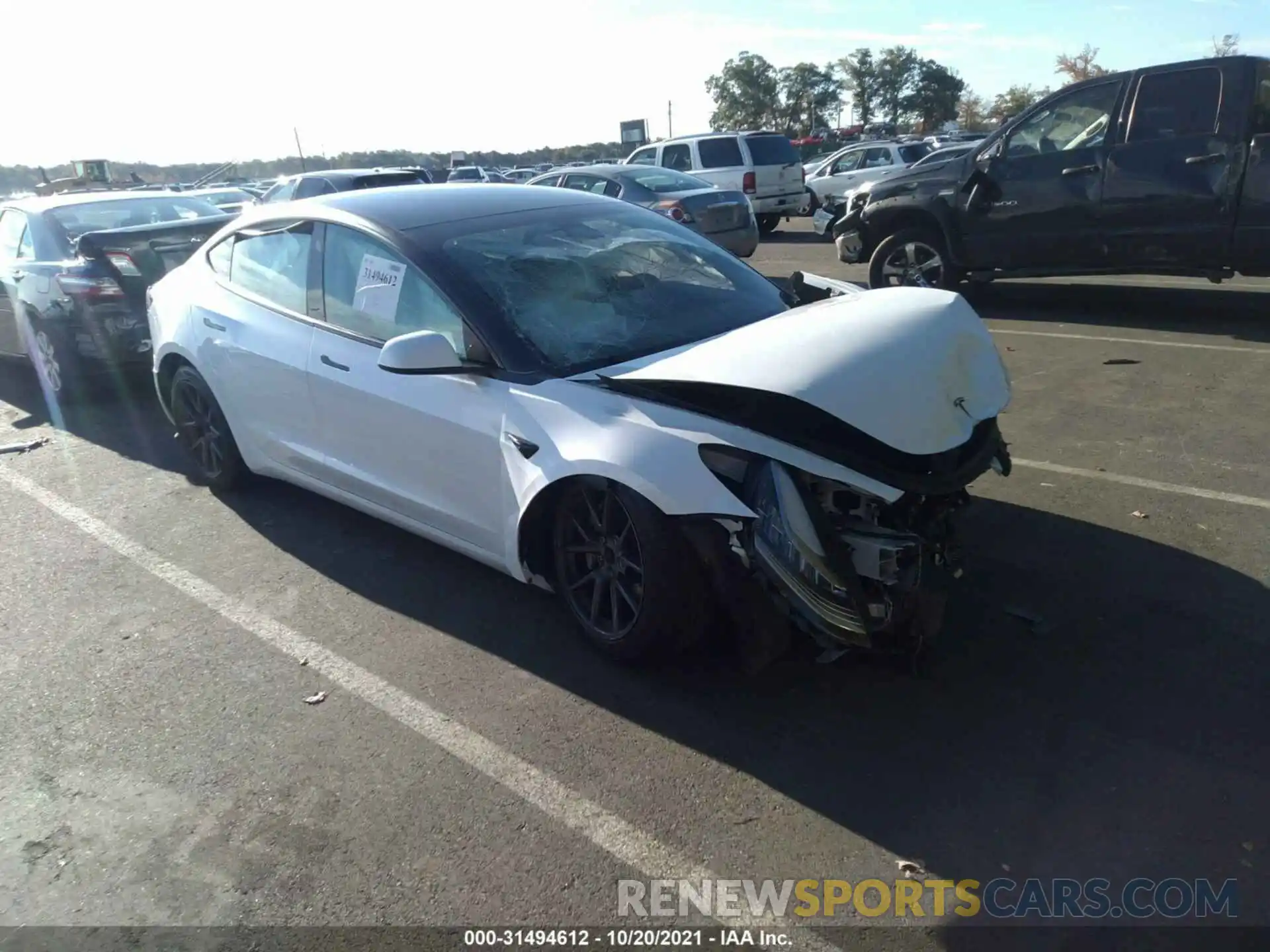 1 Photograph of a damaged car 5YJ3E1EA0MF852104 TESLA MODEL 3 2021