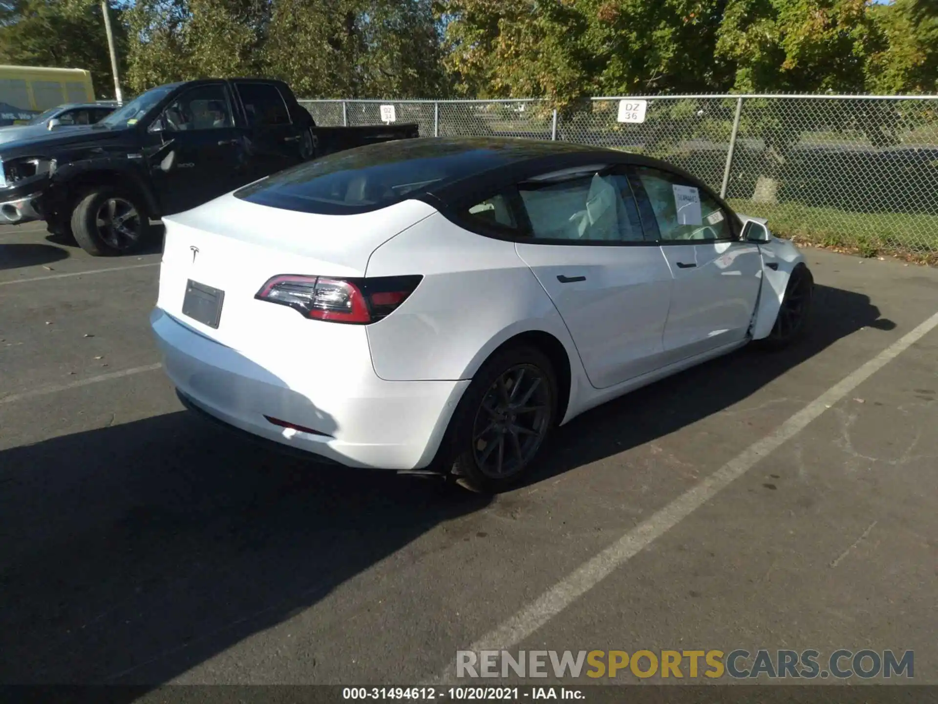 4 Photograph of a damaged car 5YJ3E1EA0MF852104 TESLA MODEL 3 2021