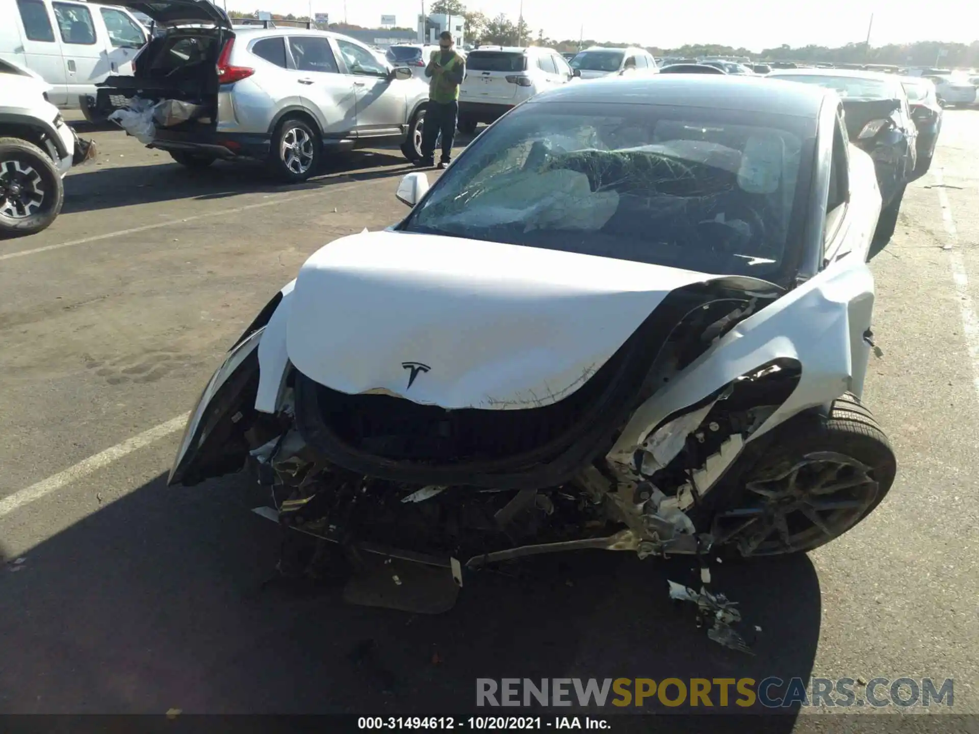 6 Photograph of a damaged car 5YJ3E1EA0MF852104 TESLA MODEL 3 2021