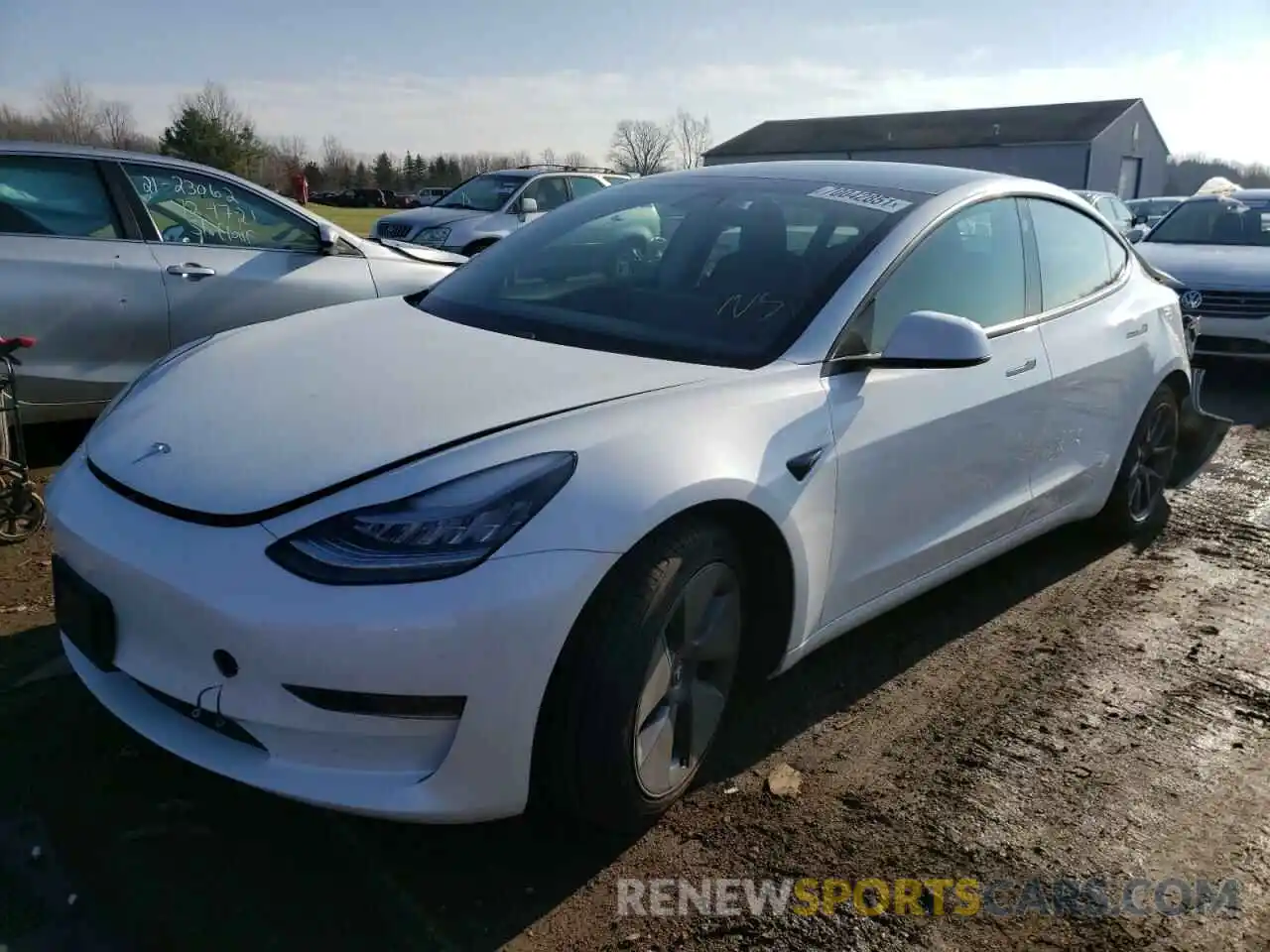 2 Photograph of a damaged car 5YJ3E1EA0MF853673 TESLA MODEL 3 2021