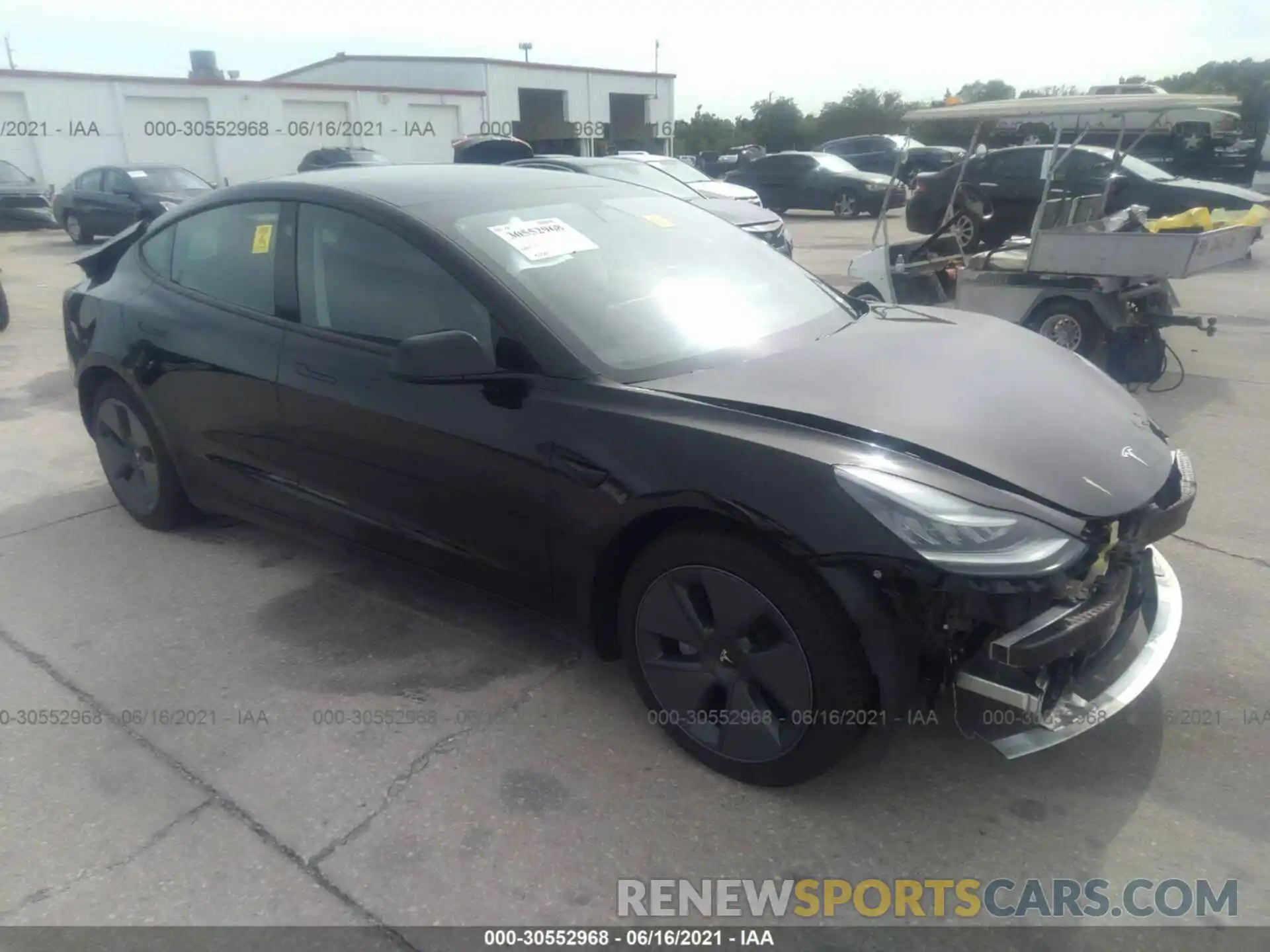 1 Photograph of a damaged car 5YJ3E1EA0MF857593 TESLA MODEL 3 2021