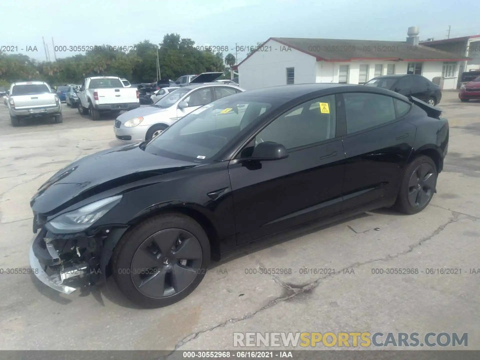 2 Photograph of a damaged car 5YJ3E1EA0MF857593 TESLA MODEL 3 2021