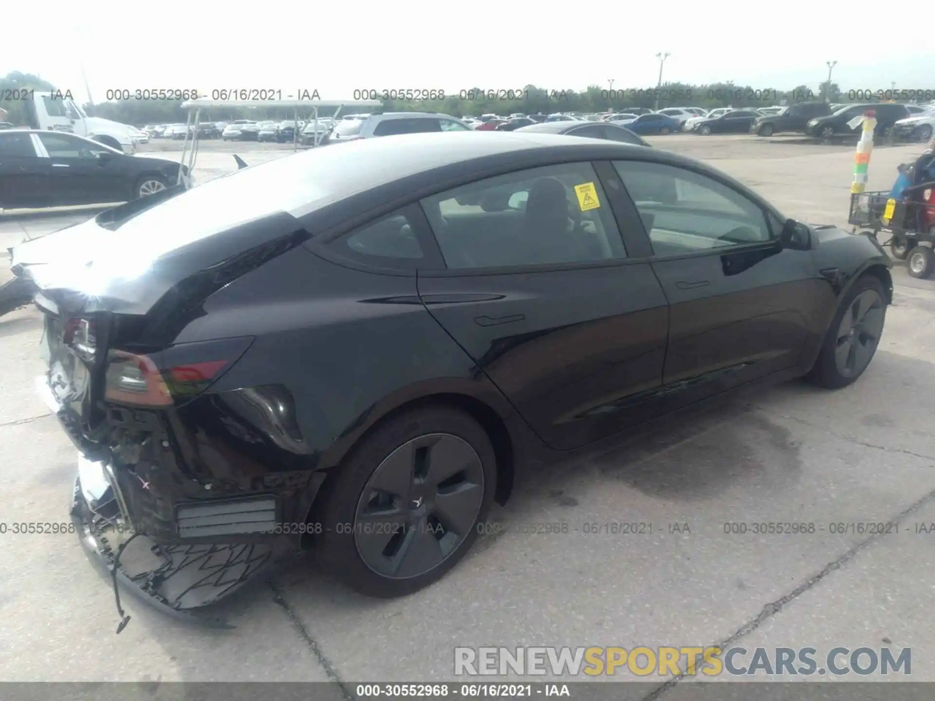 4 Photograph of a damaged car 5YJ3E1EA0MF857593 TESLA MODEL 3 2021