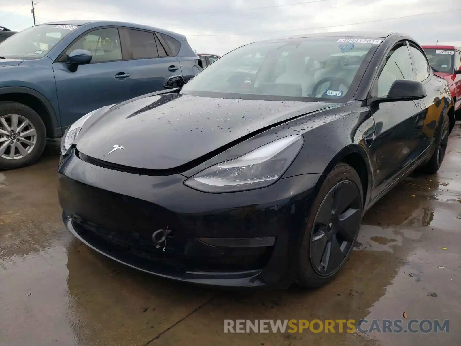 2 Photograph of a damaged car 5YJ3E1EA0MF871168 TESLA MODEL 3 2021