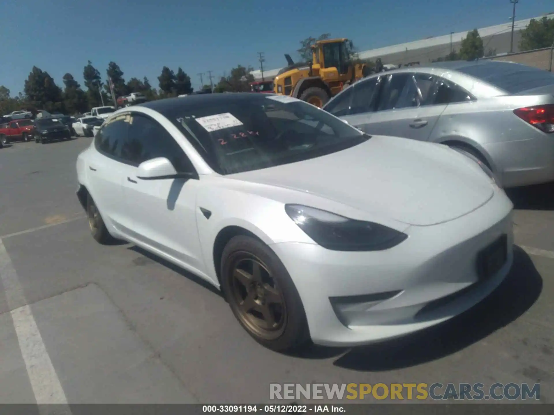 1 Photograph of a damaged car 5YJ3E1EA0MF874183 TESLA MODEL 3 2021