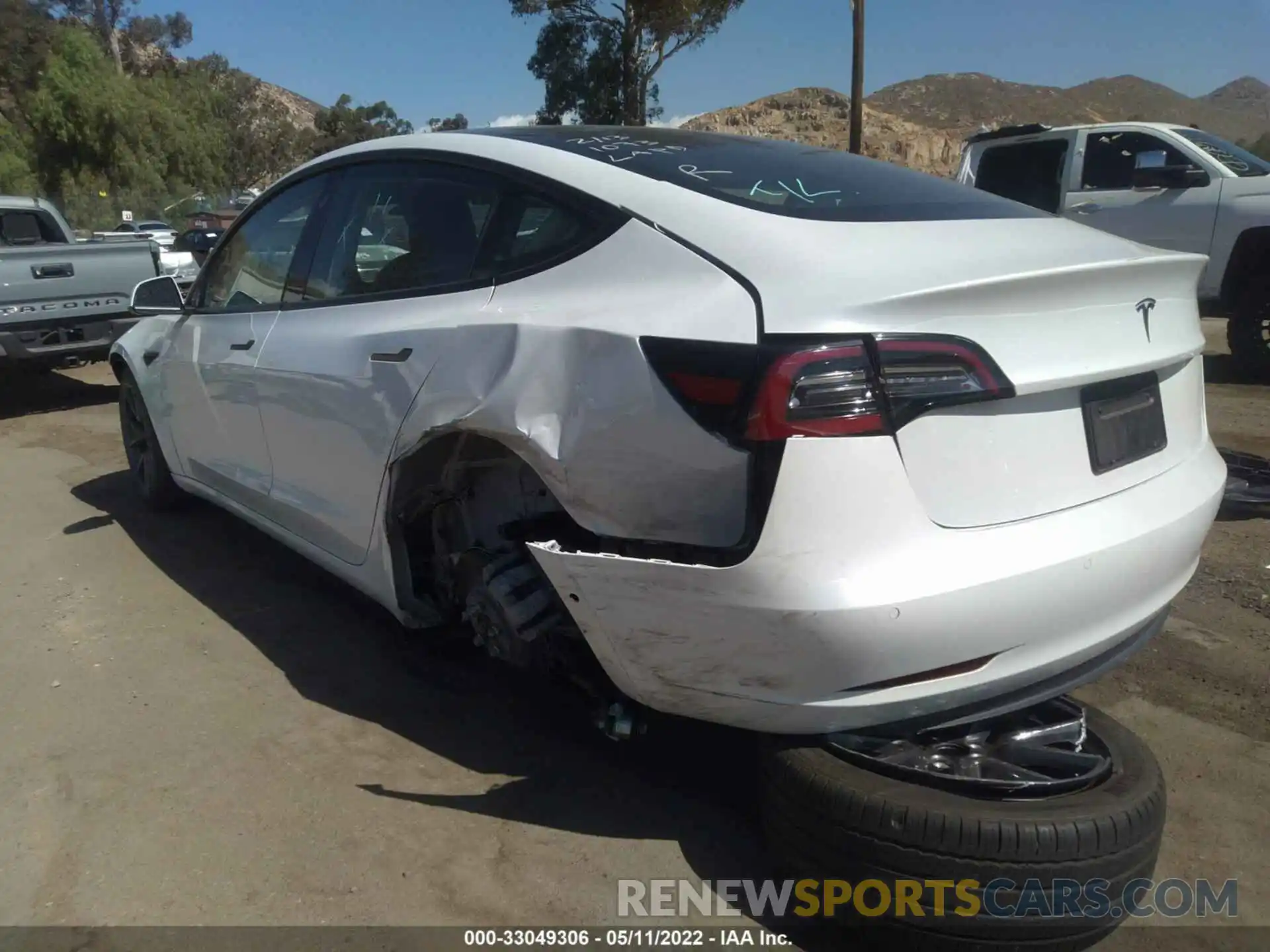 11 Photograph of a damaged car 5YJ3E1EA0MF878718 TESLA MODEL 3 2021