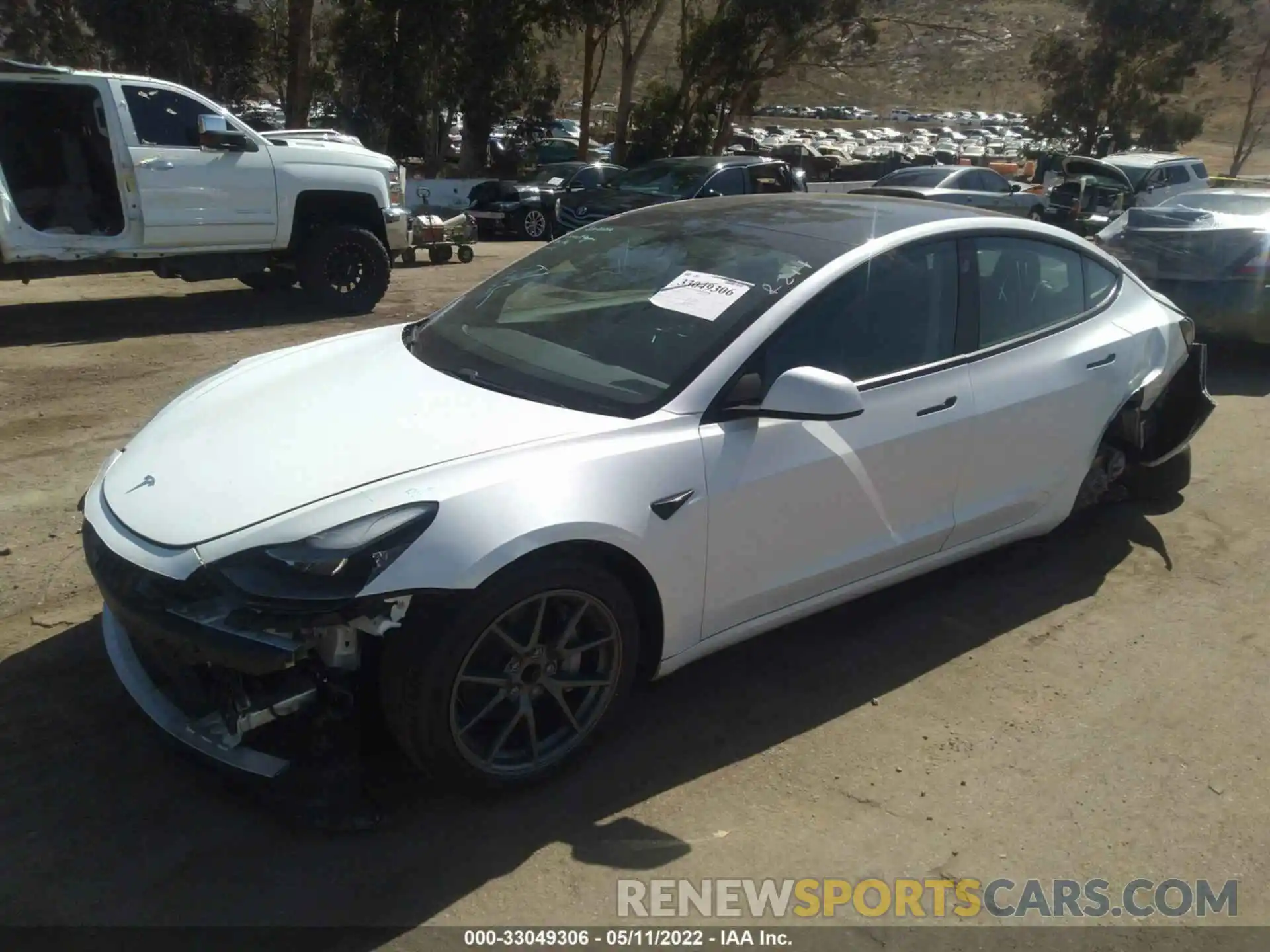 2 Photograph of a damaged car 5YJ3E1EA0MF878718 TESLA MODEL 3 2021