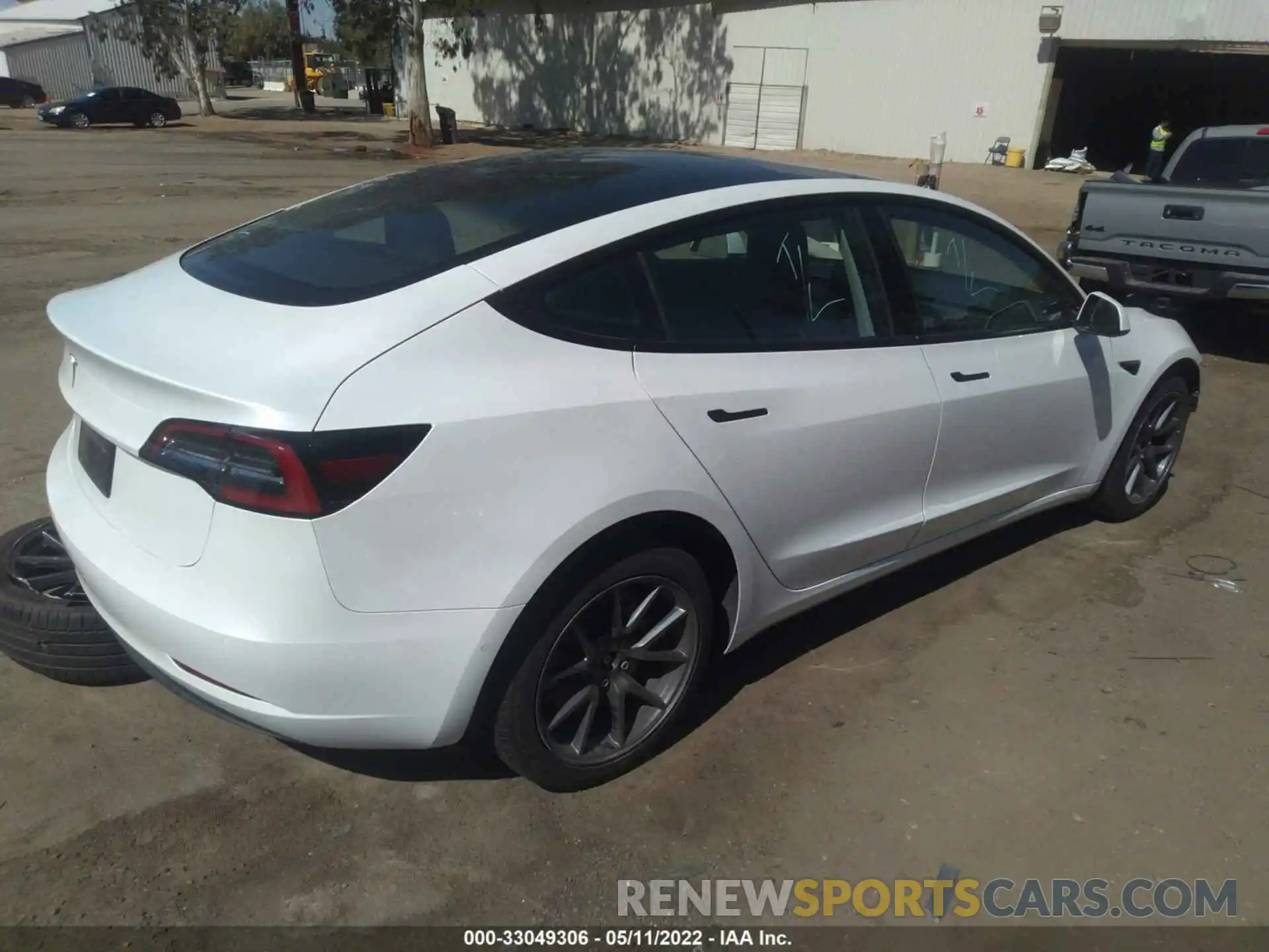 4 Photograph of a damaged car 5YJ3E1EA0MF878718 TESLA MODEL 3 2021