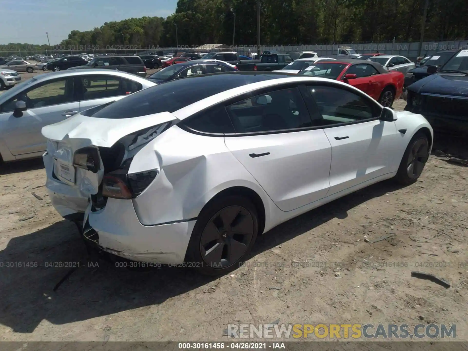 4 Photograph of a damaged car 5YJ3E1EA0MF908543 TESLA MODEL 3 2021