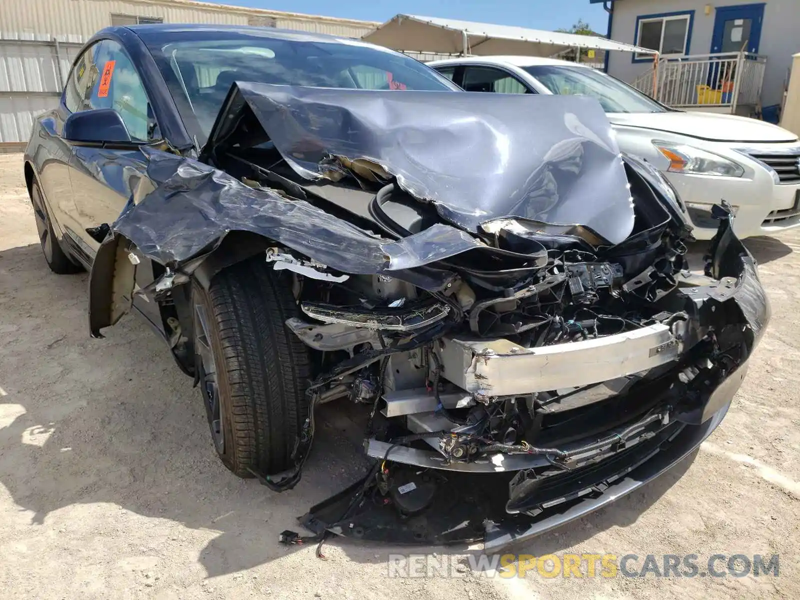 1 Photograph of a damaged car 5YJ3E1EA0MF914858 TESLA MODEL 3 2021