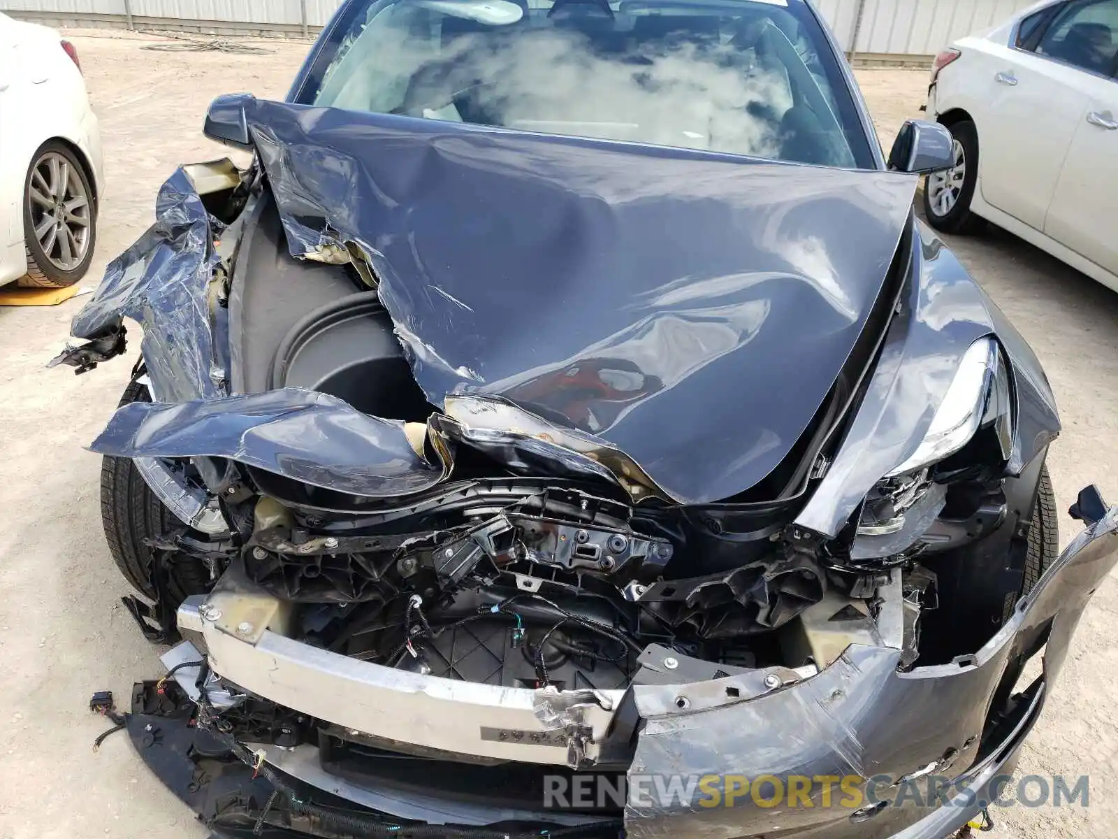 7 Photograph of a damaged car 5YJ3E1EA0MF914858 TESLA MODEL 3 2021