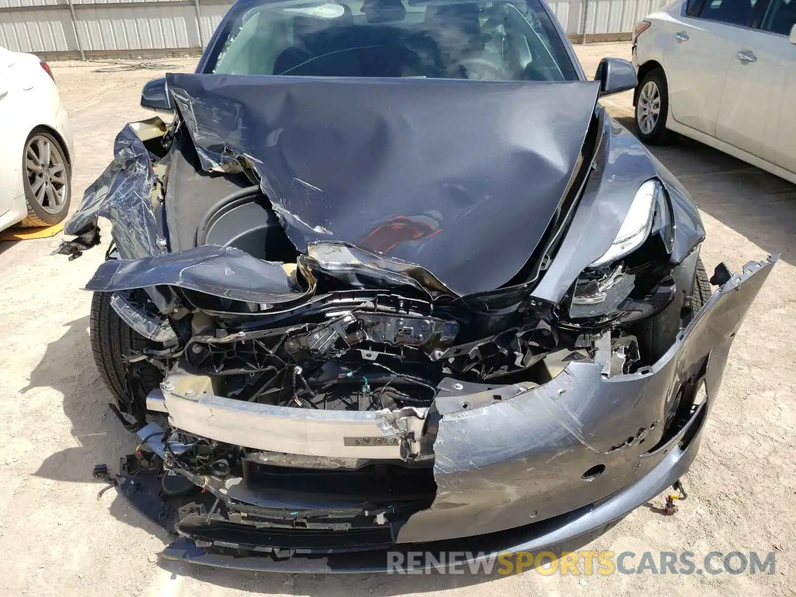 9 Photograph of a damaged car 5YJ3E1EA0MF914858 TESLA MODEL 3 2021