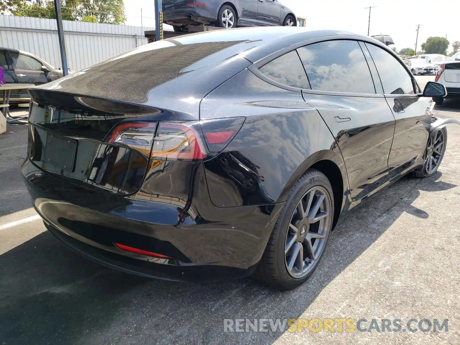 4 Photograph of a damaged car 5YJ3E1EA0MF922281 TESLA MODEL 3 2021