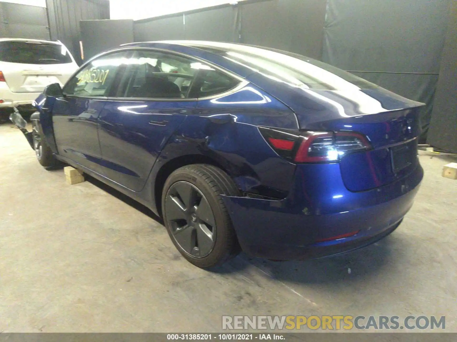 3 Photograph of a damaged car 5YJ3E1EA0MF922765 TESLA MODEL 3 2021