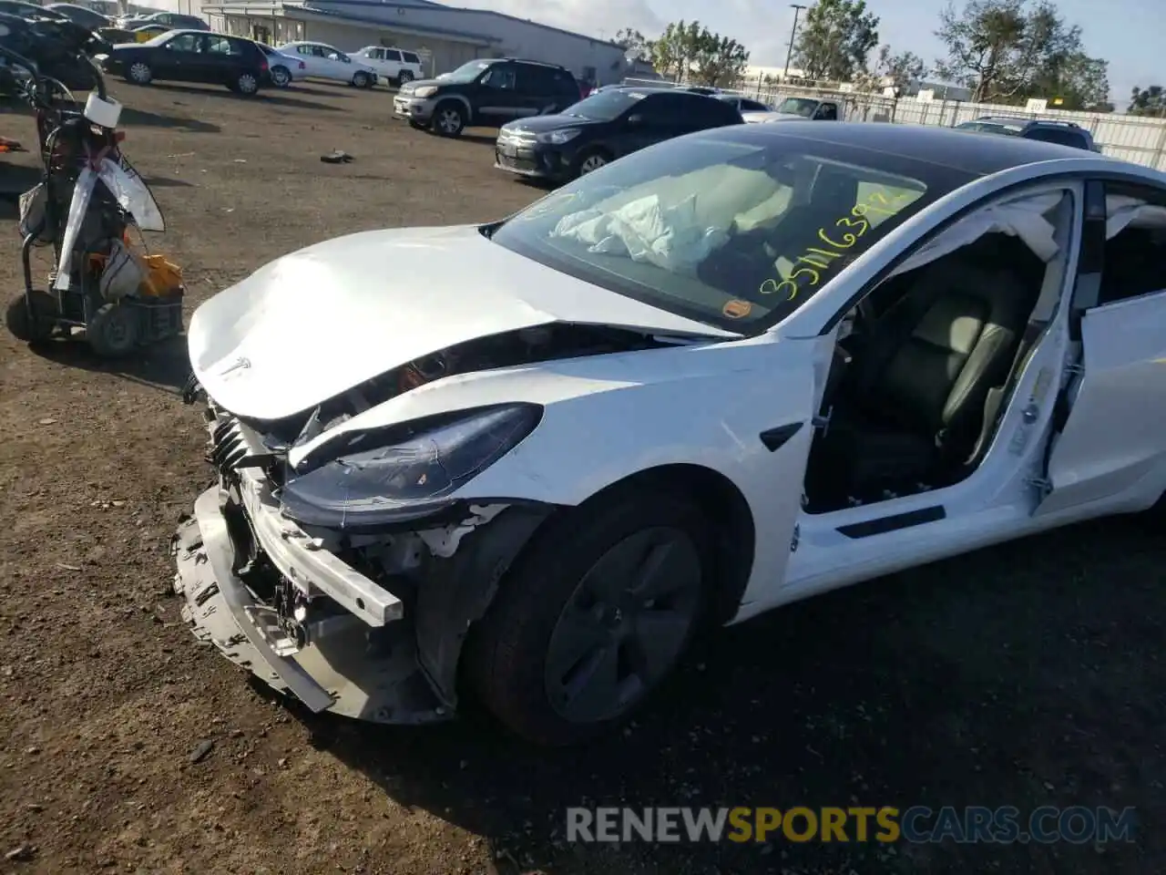 9 Photograph of a damaged car 5YJ3E1EA0MF923477 TESLA MODEL 3 2021