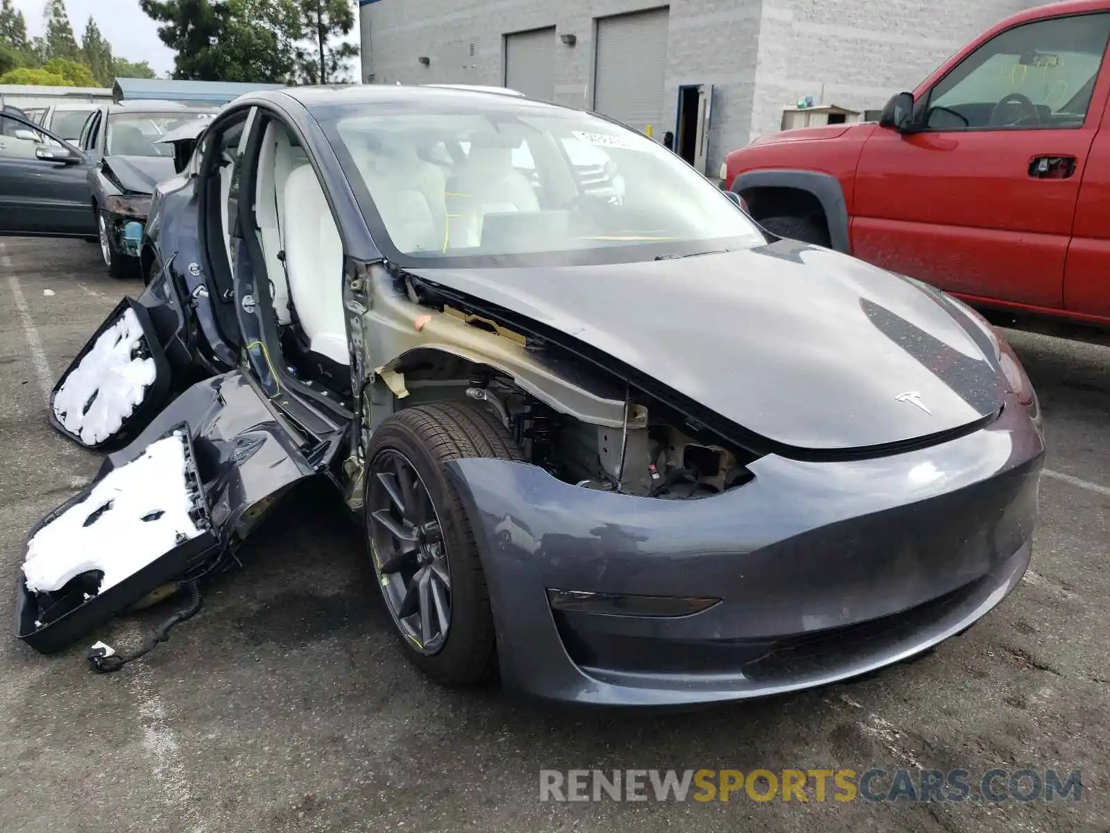 1 Photograph of a damaged car 5YJ3E1EA0MF928730 TESLA MODEL 3 2021