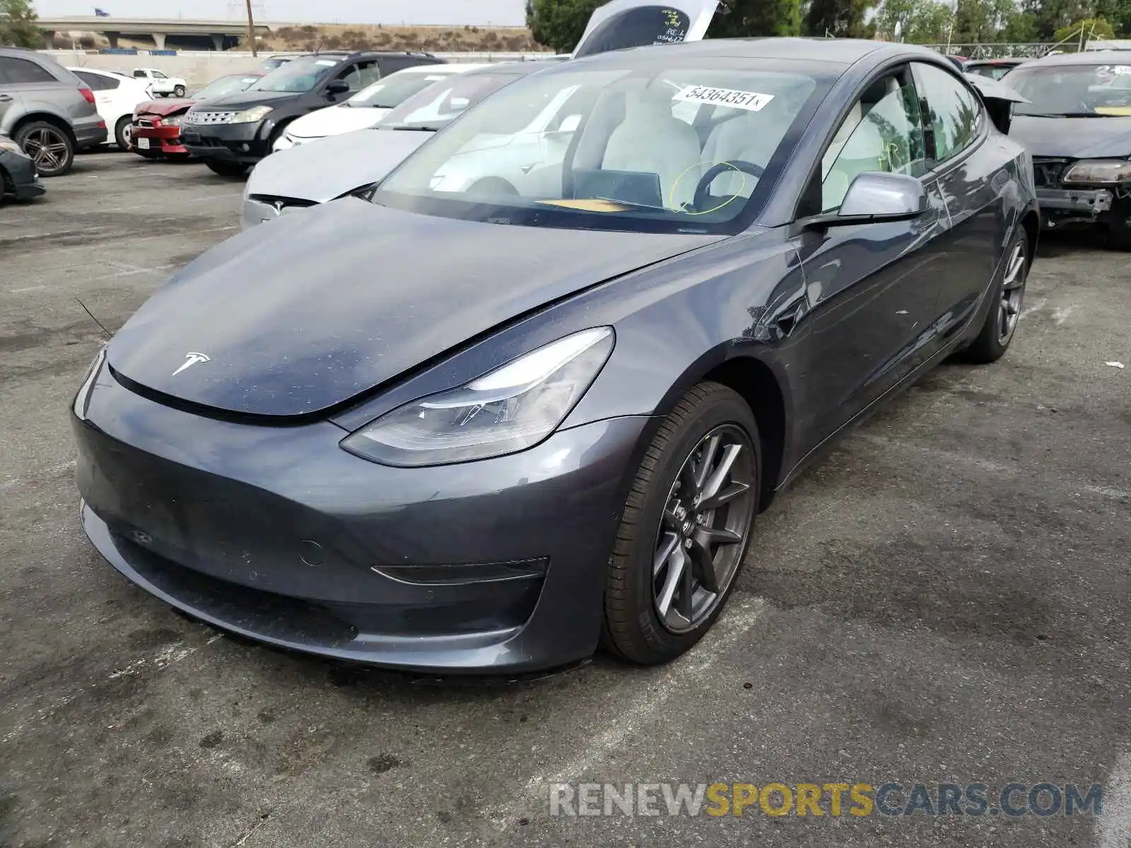 2 Photograph of a damaged car 5YJ3E1EA0MF928730 TESLA MODEL 3 2021