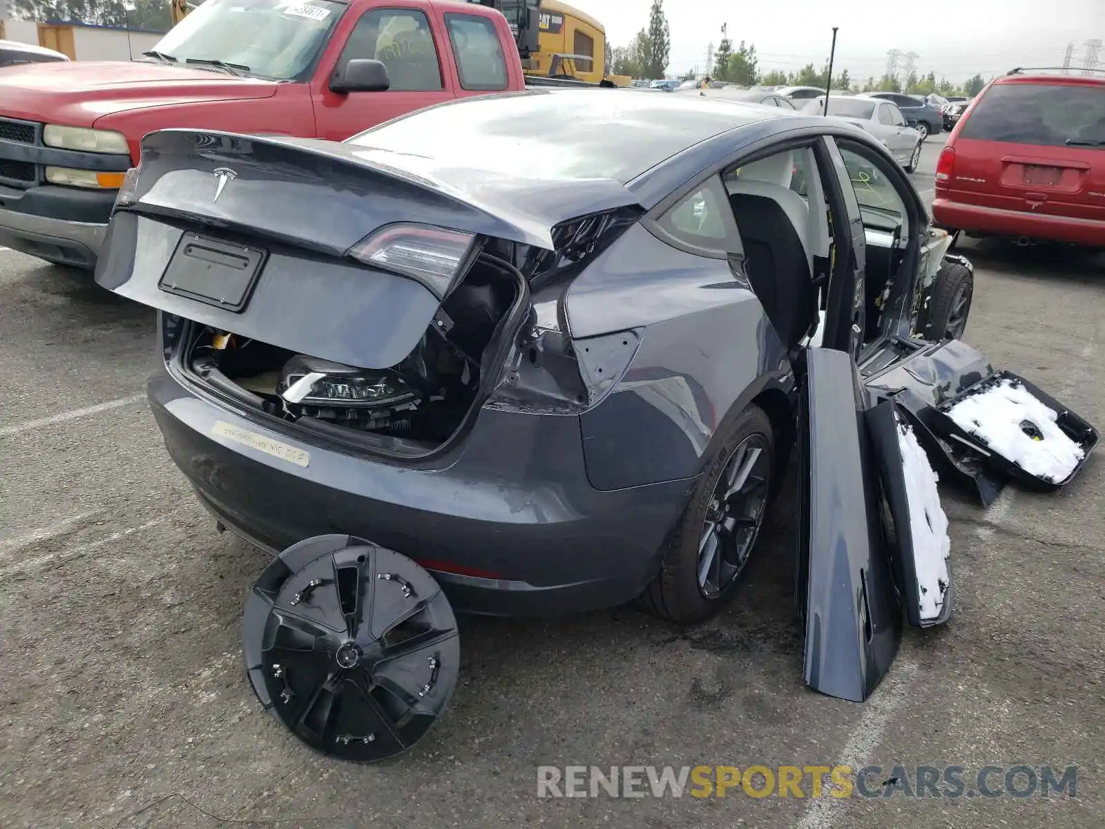 4 Photograph of a damaged car 5YJ3E1EA0MF928730 TESLA MODEL 3 2021