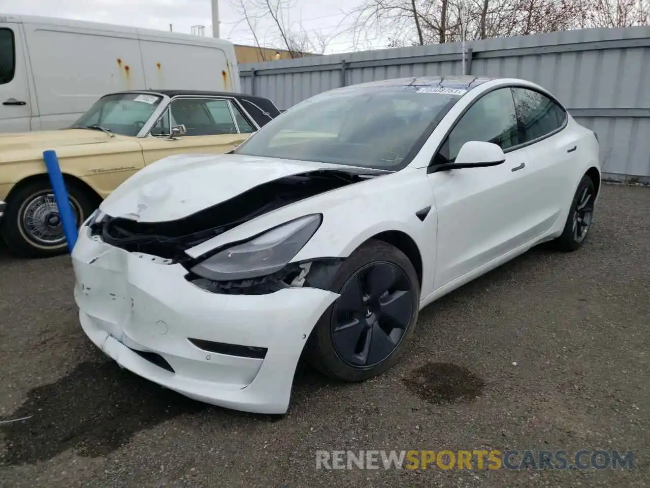 2 Photograph of a damaged car 5YJ3E1EA0MF976499 TESLA MODEL 3 2021