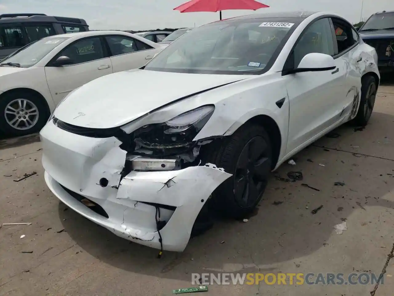 2 Photograph of a damaged car 5YJ3E1EA0MF976874 TESLA MODEL 3 2021