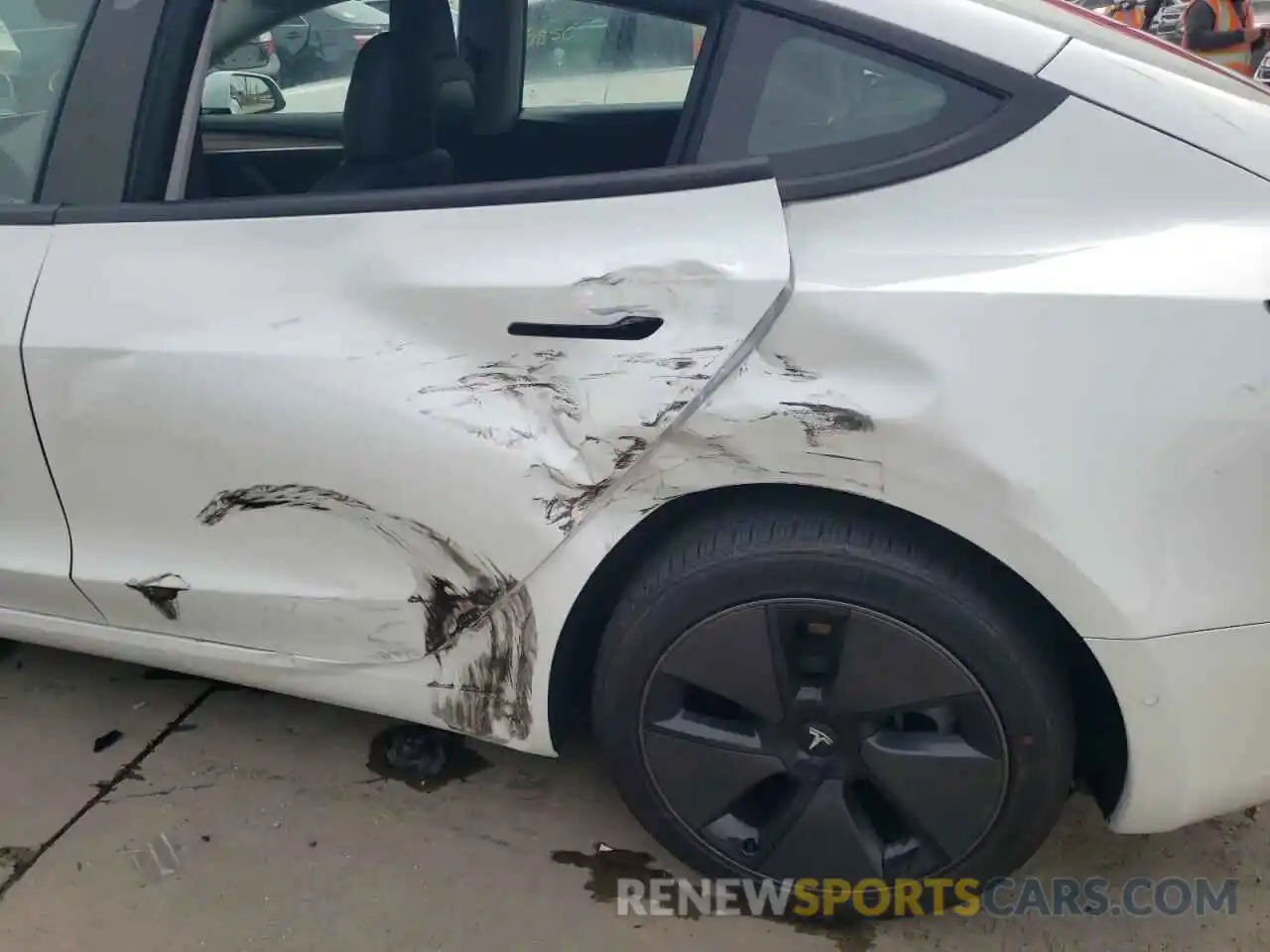 9 Photograph of a damaged car 5YJ3E1EA0MF976874 TESLA MODEL 3 2021