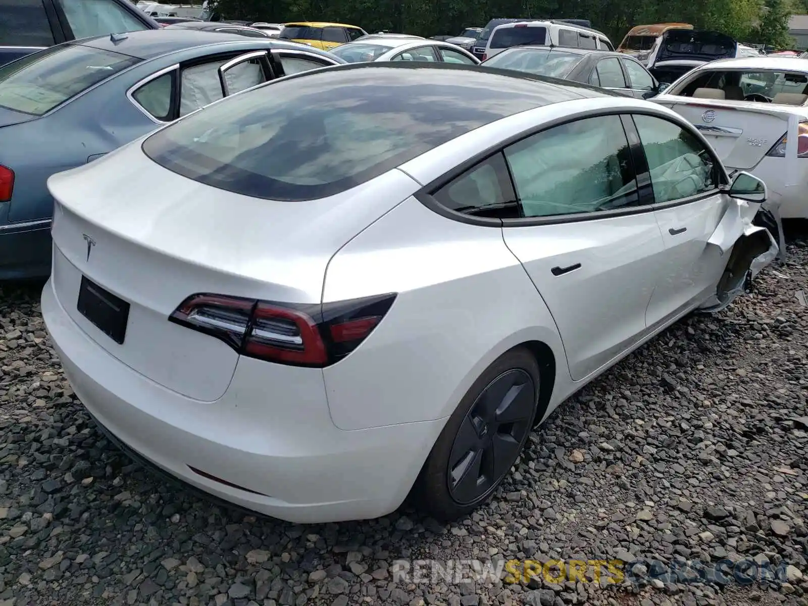 4 Photograph of a damaged car 5YJ3E1EA0MF977412 TESLA MODEL 3 2021