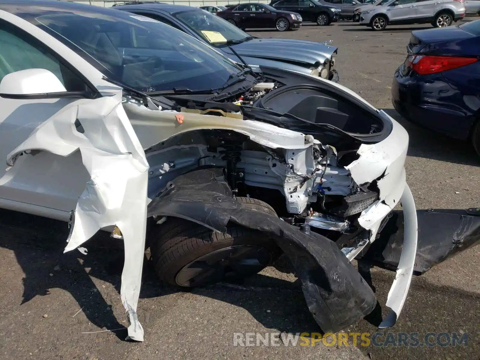 9 Photograph of a damaged car 5YJ3E1EA0MF977412 TESLA MODEL 3 2021