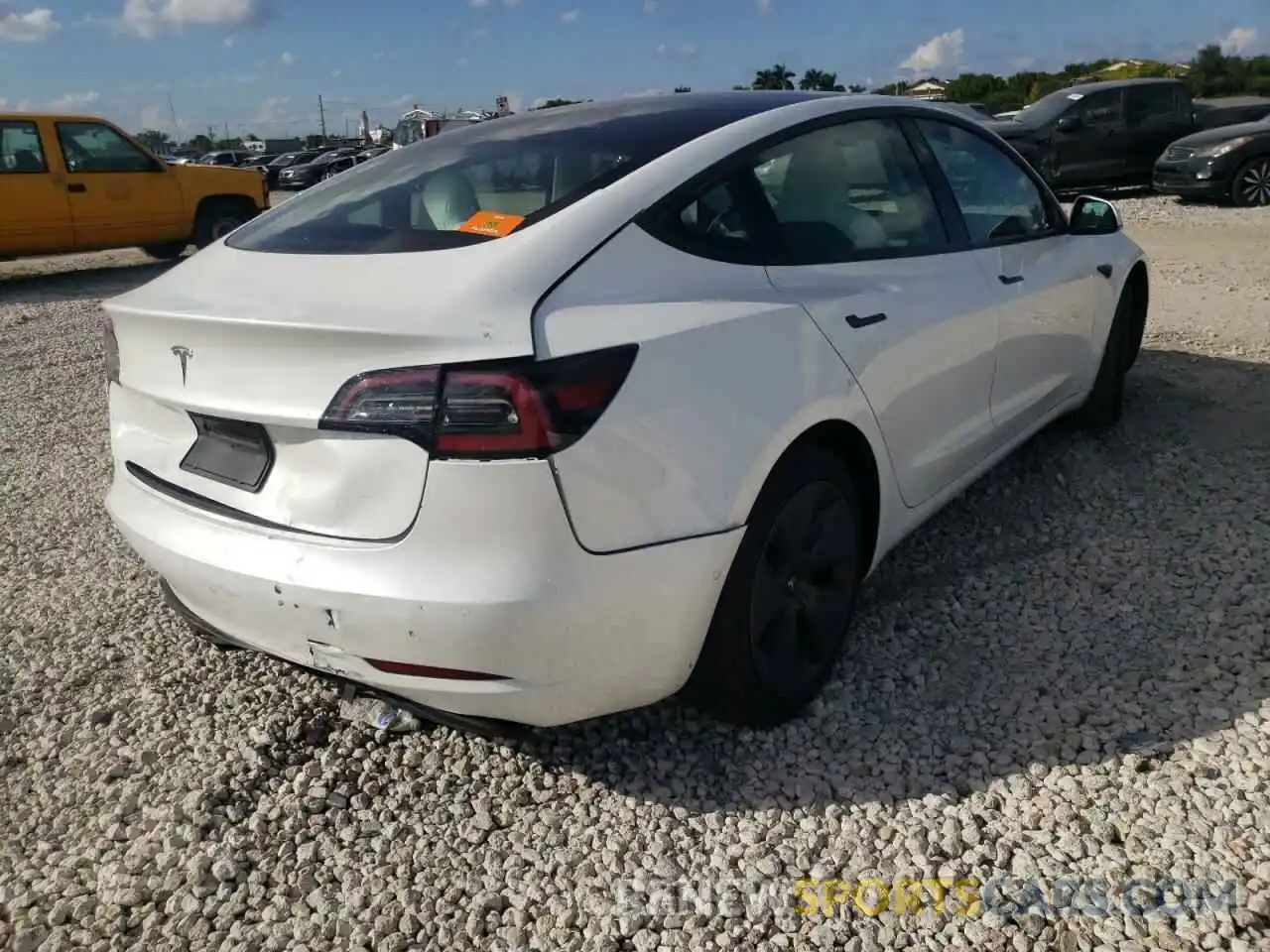 4 Photograph of a damaged car 5YJ3E1EA0MF977975 TESLA MODEL 3 2021