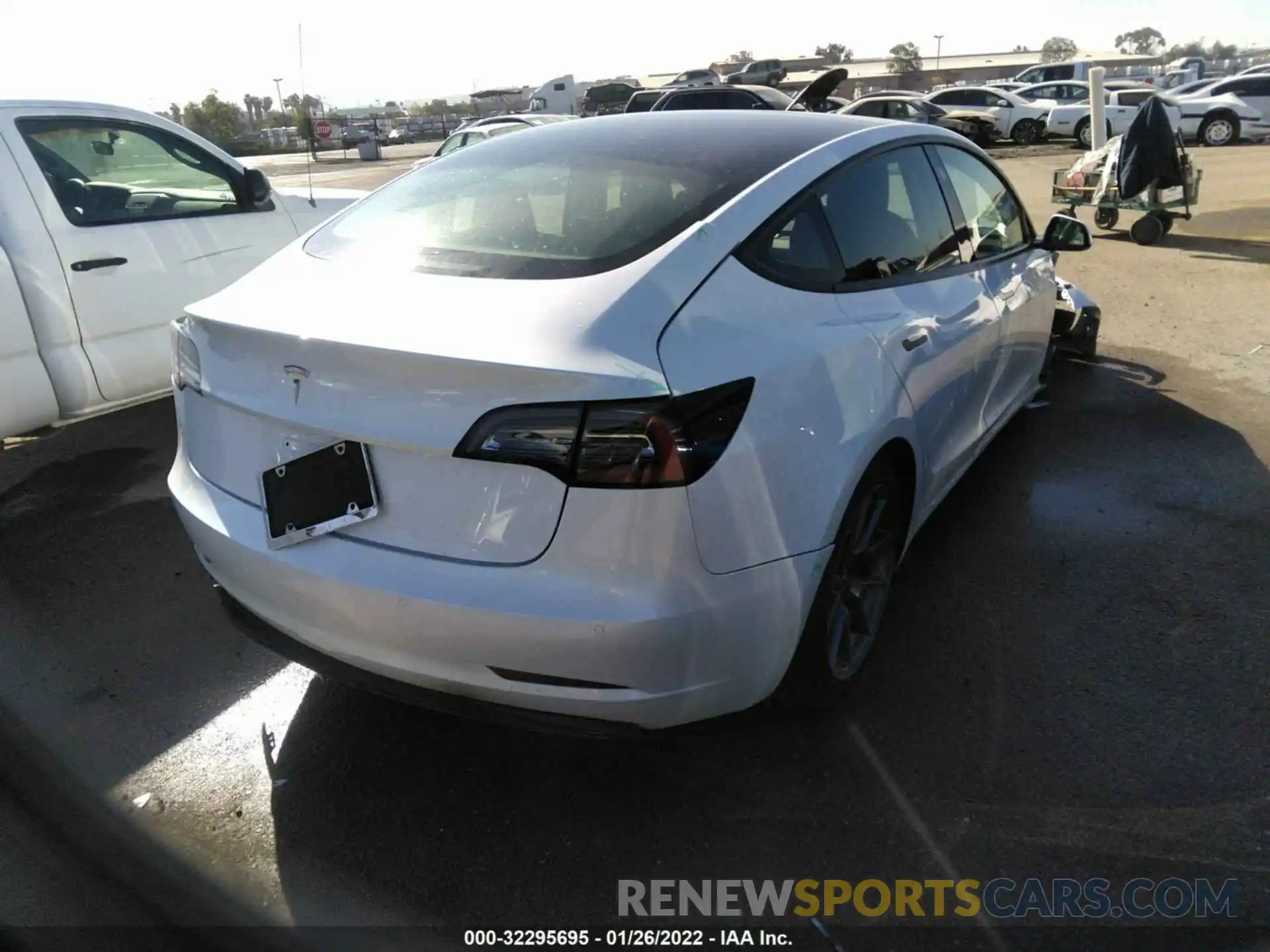 4 Photograph of a damaged car 5YJ3E1EA0MF986319 TESLA MODEL 3 2021