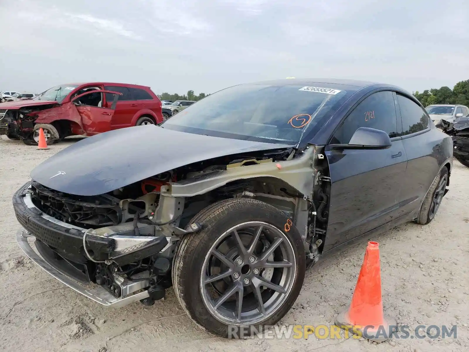 2 Photograph of a damaged car 5YJ3E1EA0MF991133 TESLA MODEL 3 2021