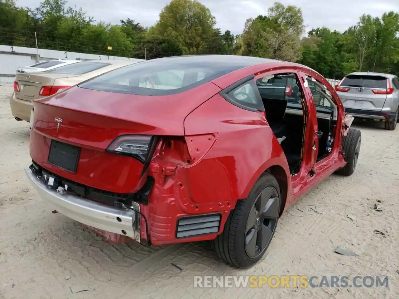 4 Photograph of a damaged car 5YJ3E1EA0MF991472 TESLA MODEL 3 2021