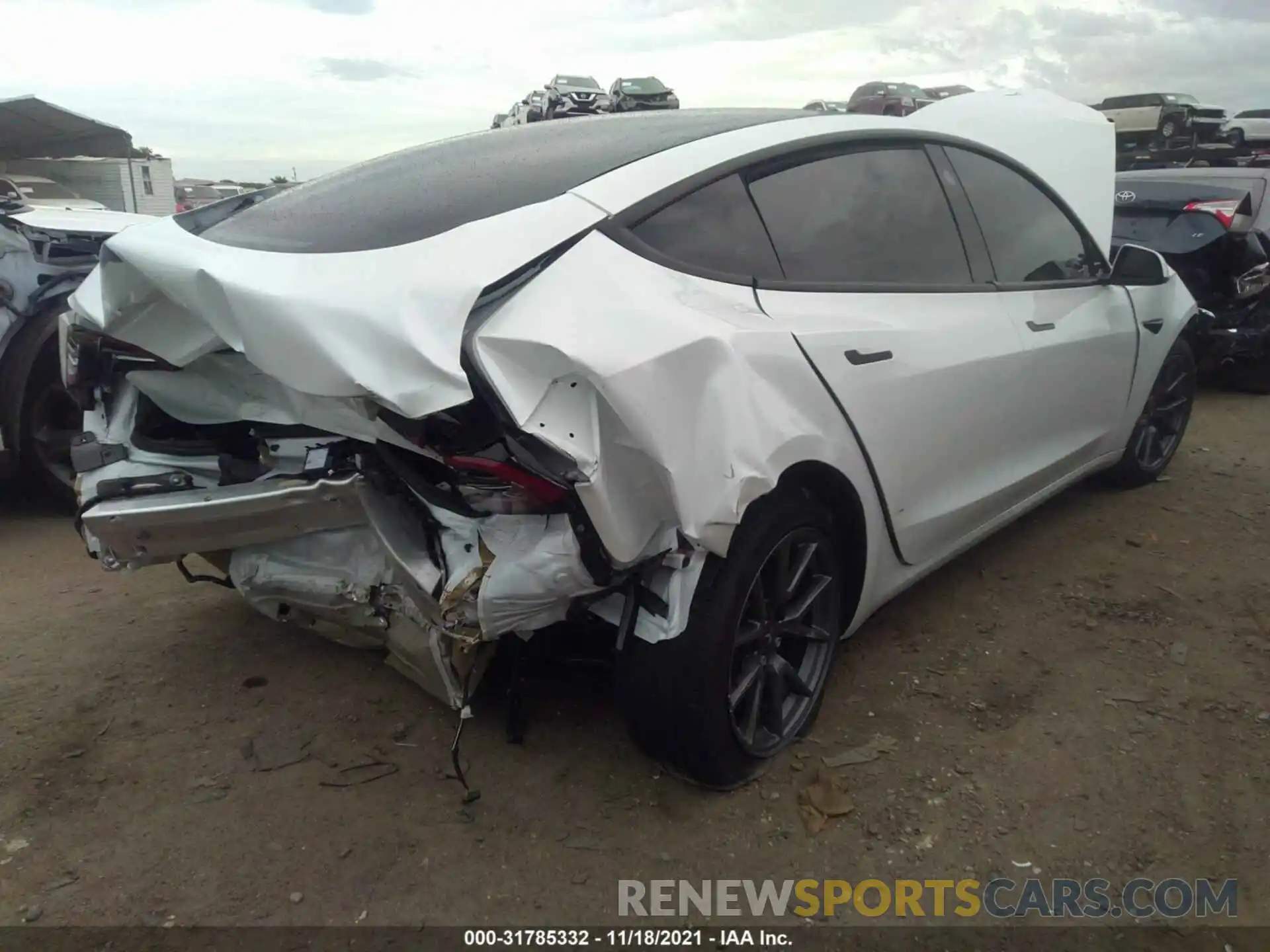 4 Photograph of a damaged car 5YJ3E1EA0MF991746 TESLA MODEL 3 2021