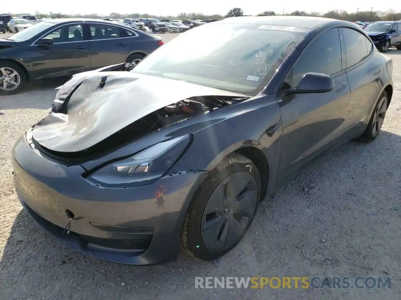 2 Photograph of a damaged car 5YJ3E1EA0MF994730 TESLA MODEL 3 2021